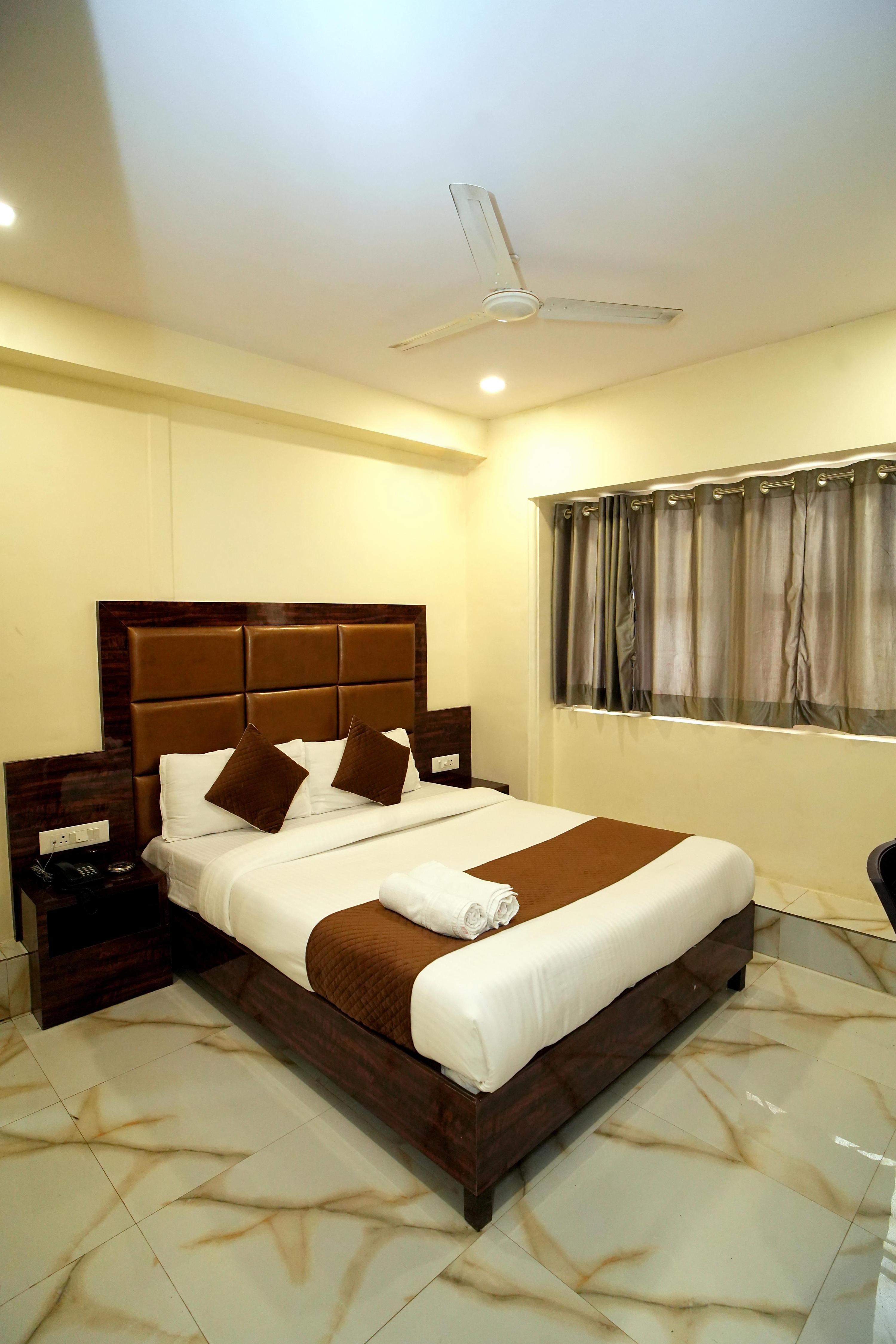 Hotel Rinza Residency - Tap to explore photos