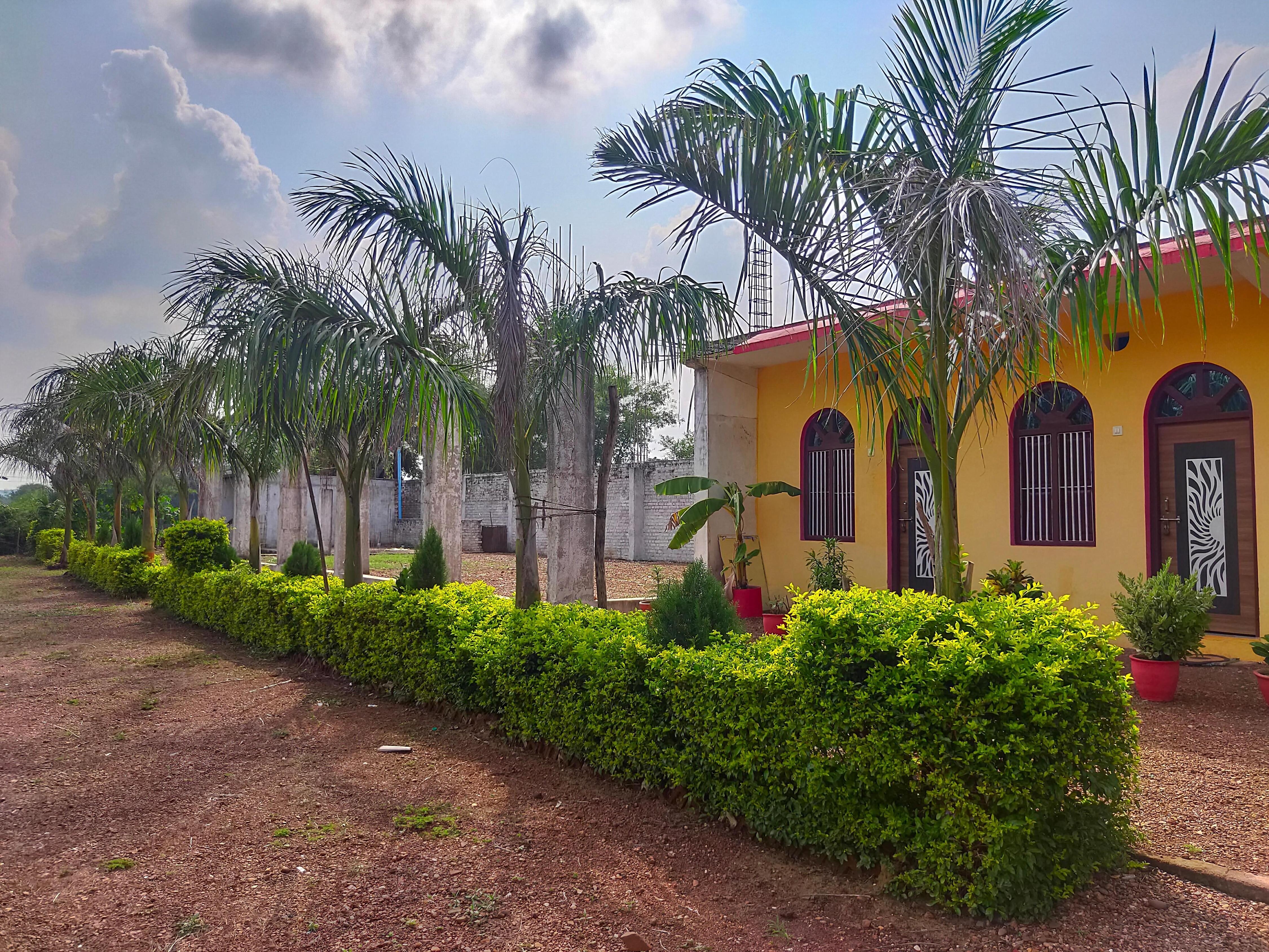 grand shehnai garden and guest house - Tap to explore photos