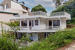 Alaya Stays 3 BHK balcony with views | Amora Vista, Baddi