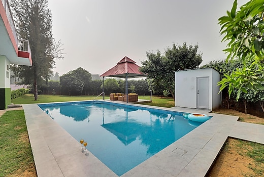 Luxurious 3 BHK farmhouse With Pvt Pool & Garden