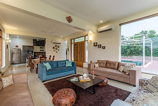 Luxe 2 BHK Farmstay with an entertainment lounge