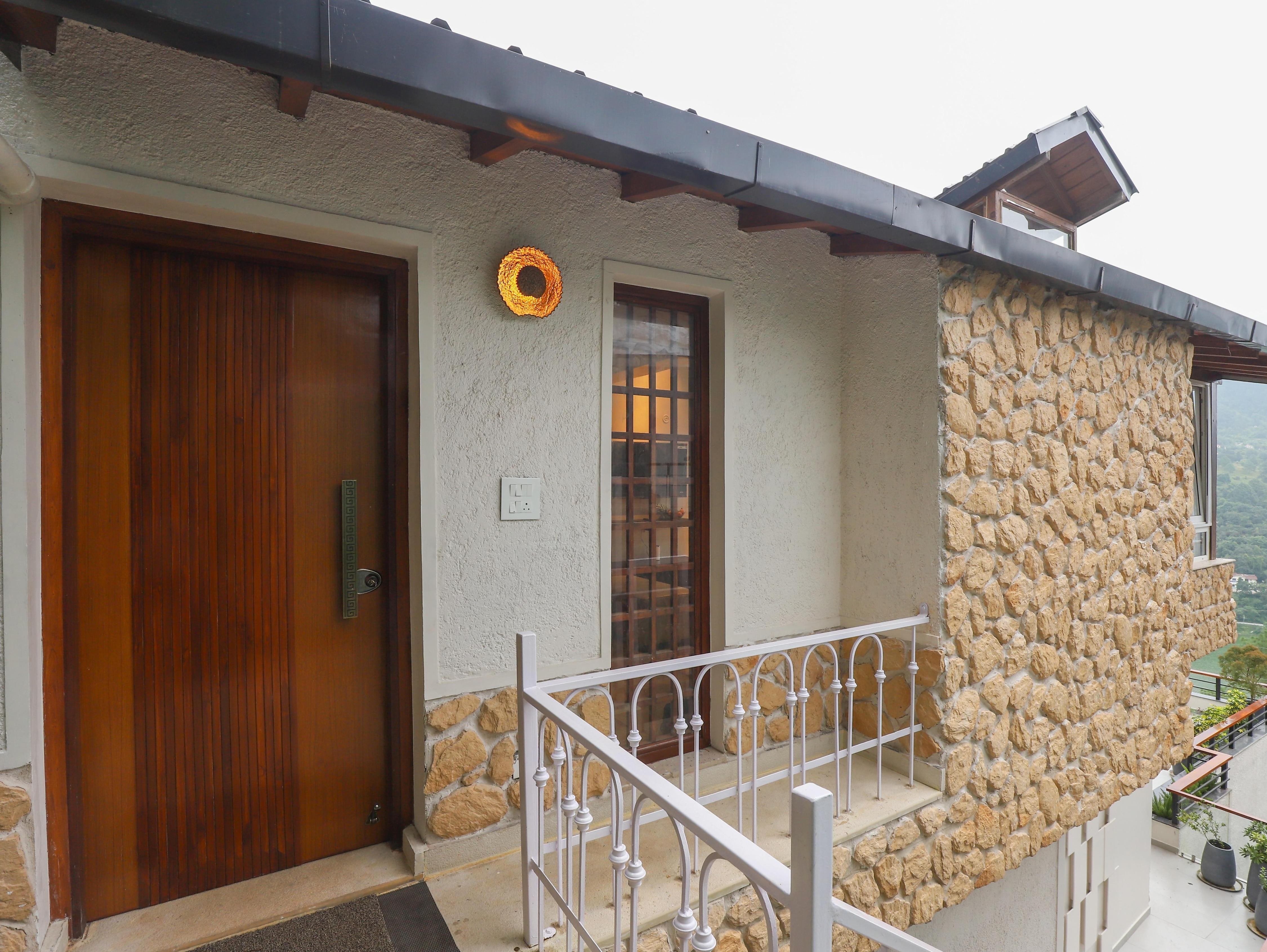 ELIVAAS Signature 2 BHK with Terrace & Lake View | Antarmann Casa Ember - Tap to explore photos