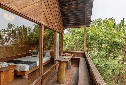 Wooden Cottage With Balcony