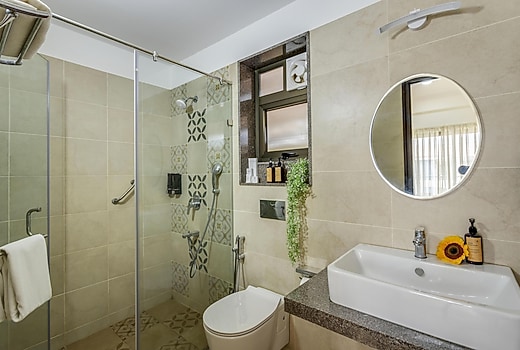 1BHK w Sauna & Common Pool, Less than 2km to Beach | Hireavilla