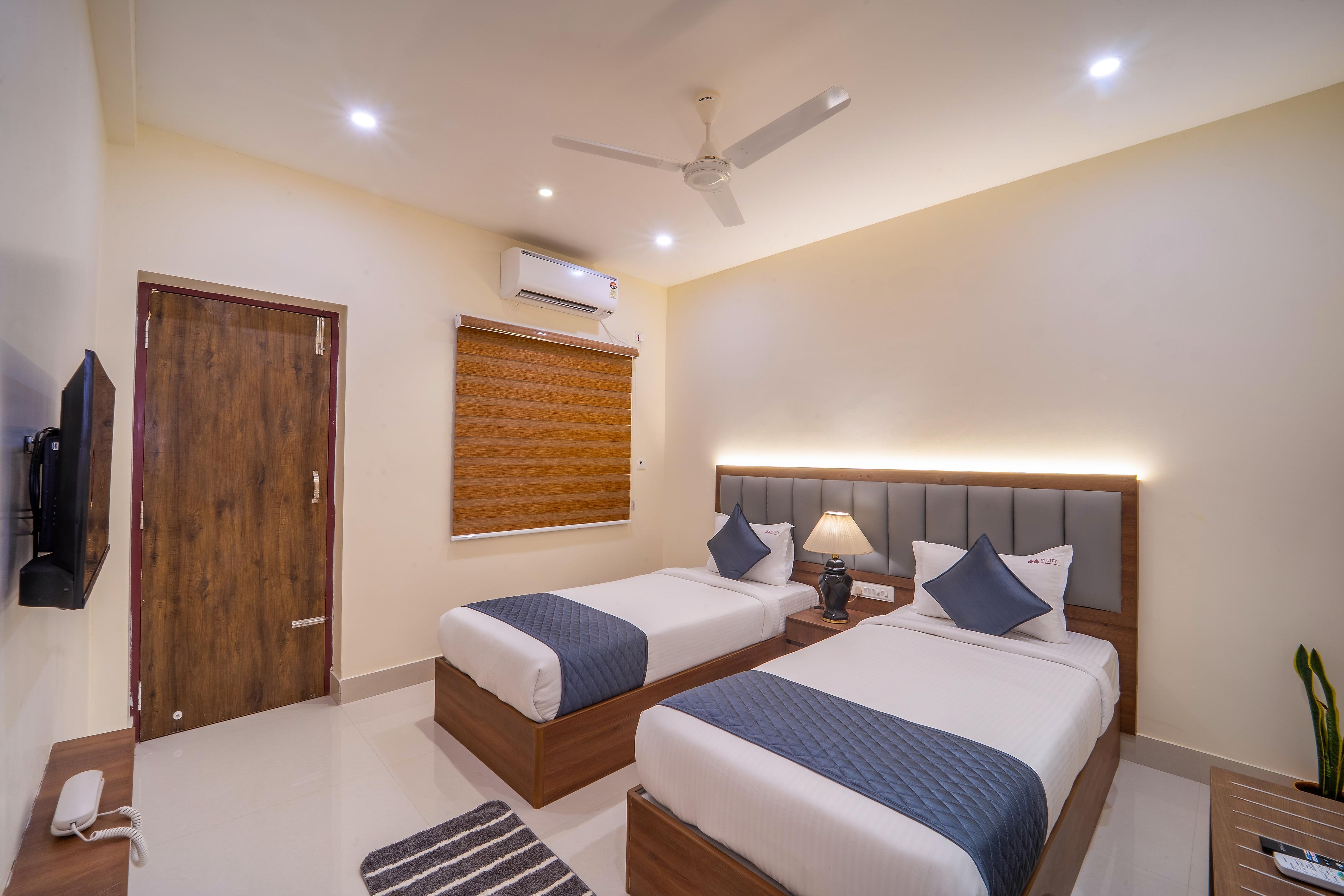 Mcity Elite Suites - Tap to explore photos