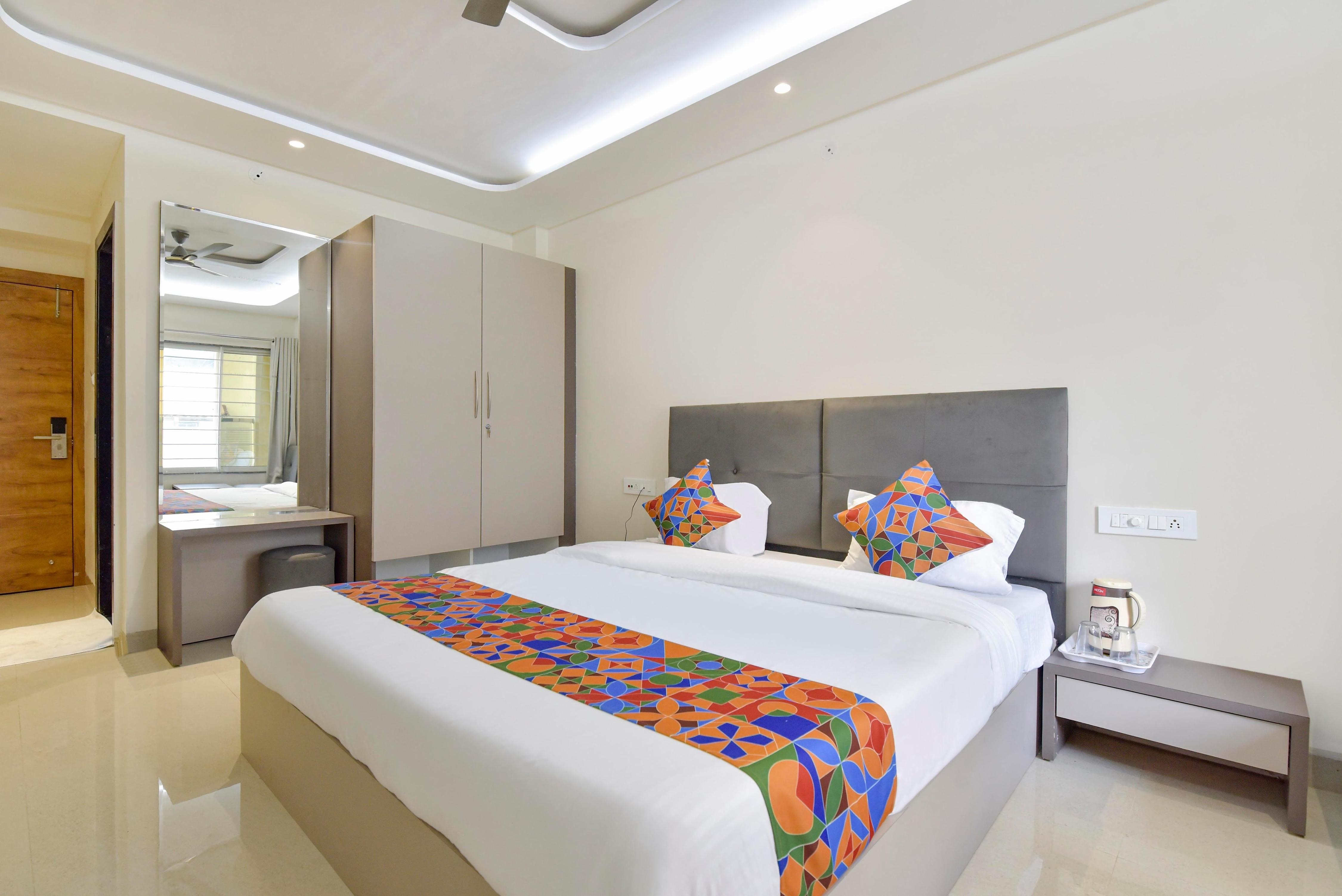 FabHotel Synergy Stays - Tap to explore photos