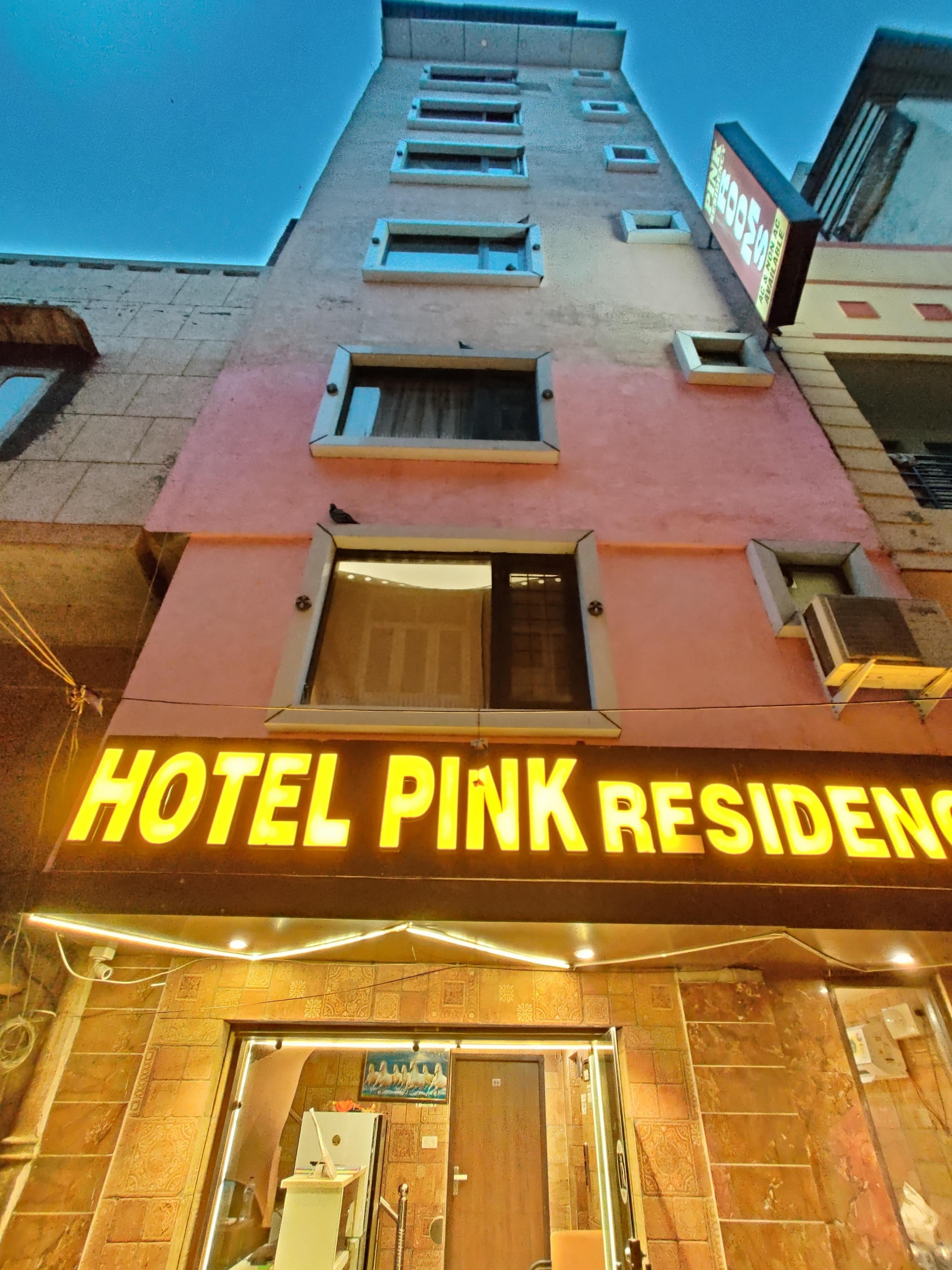 Hotel Pink Residency - Tap to explore photos
