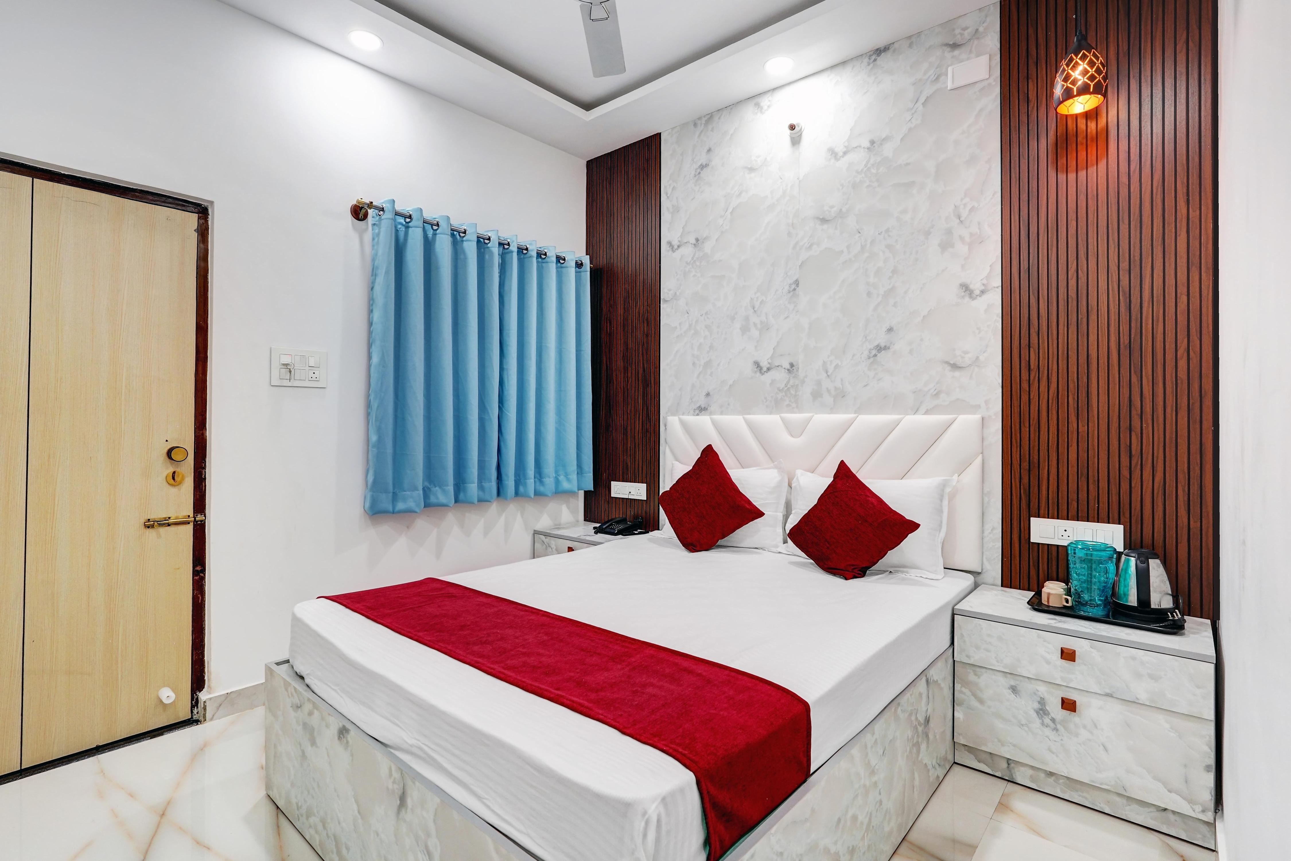 Hotel Sky Blue Suites - Tap to explore photos