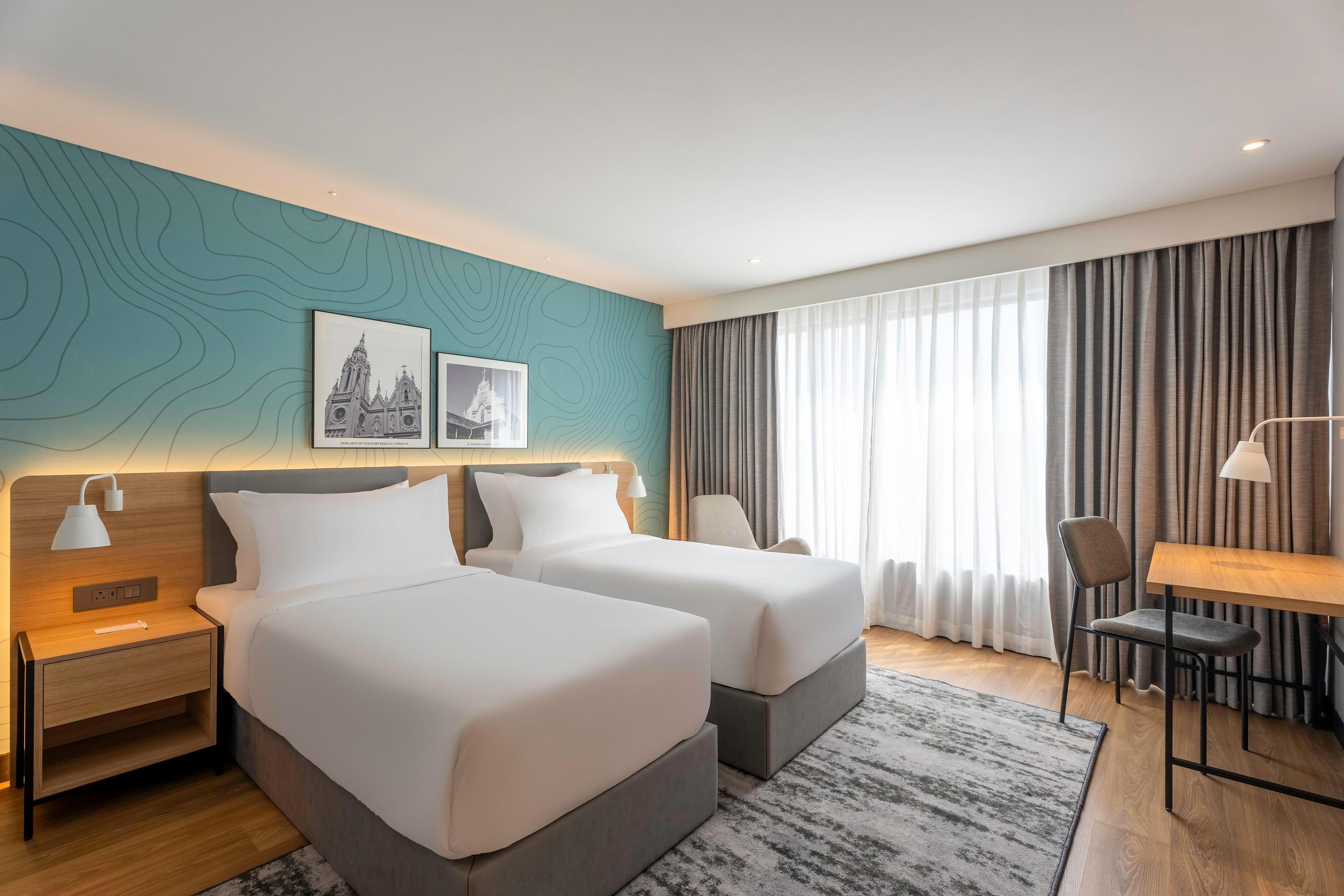 Park Inn & Suites by Radisson Thrissur East Fort - Tap to explore photos