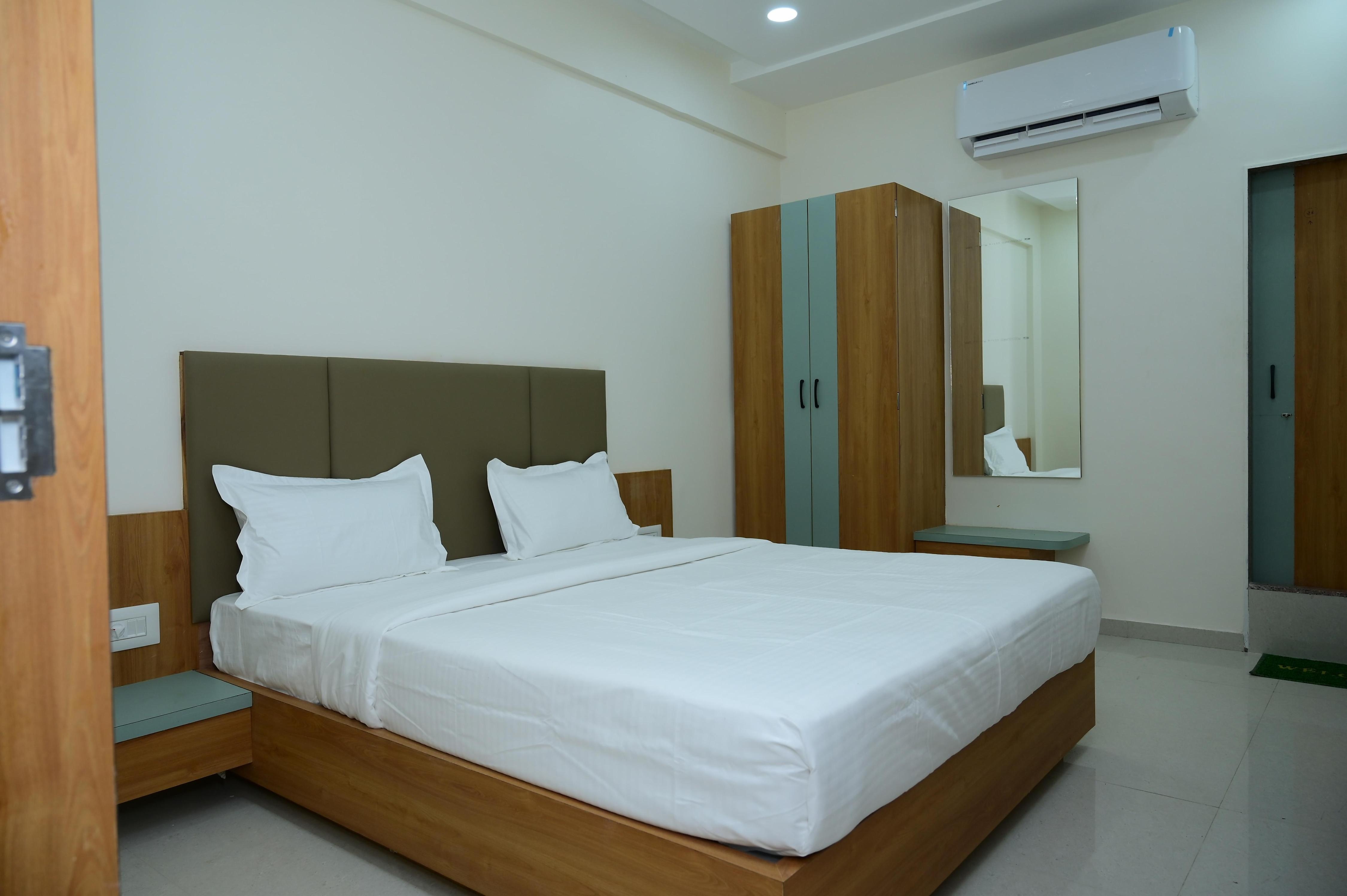 Amrutam Hotel and Guest House - Tap to explore photos