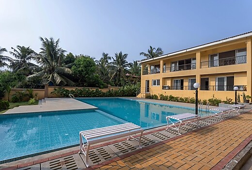 tisyastays | Azalea 1BHK Apartment with Pool & Gym , Close to beach