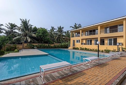tisyastays | Casa de Viva 1BHK Apartment with Pool & Gym , Close to beach
