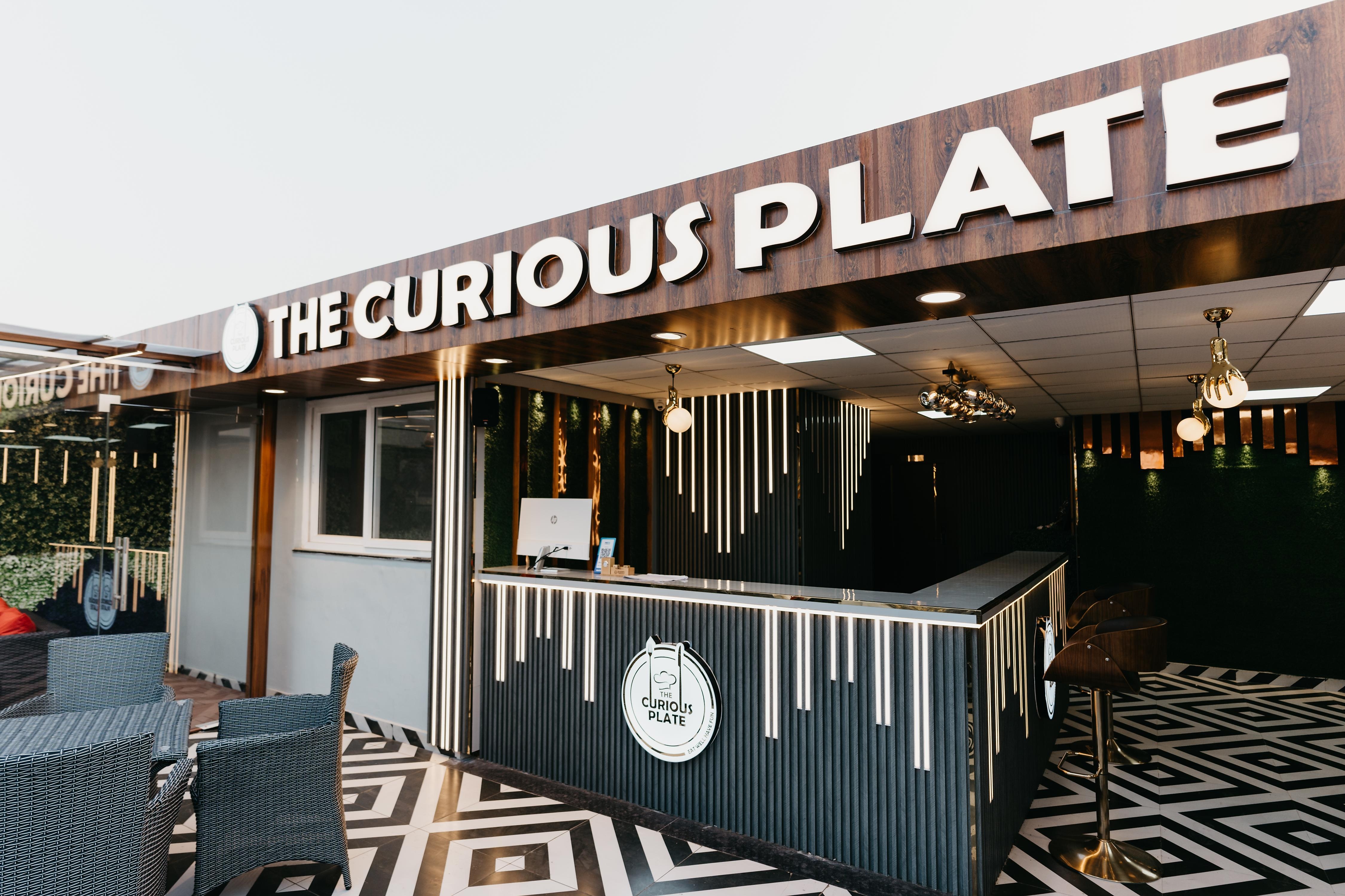 THE CURIOUS PLATE