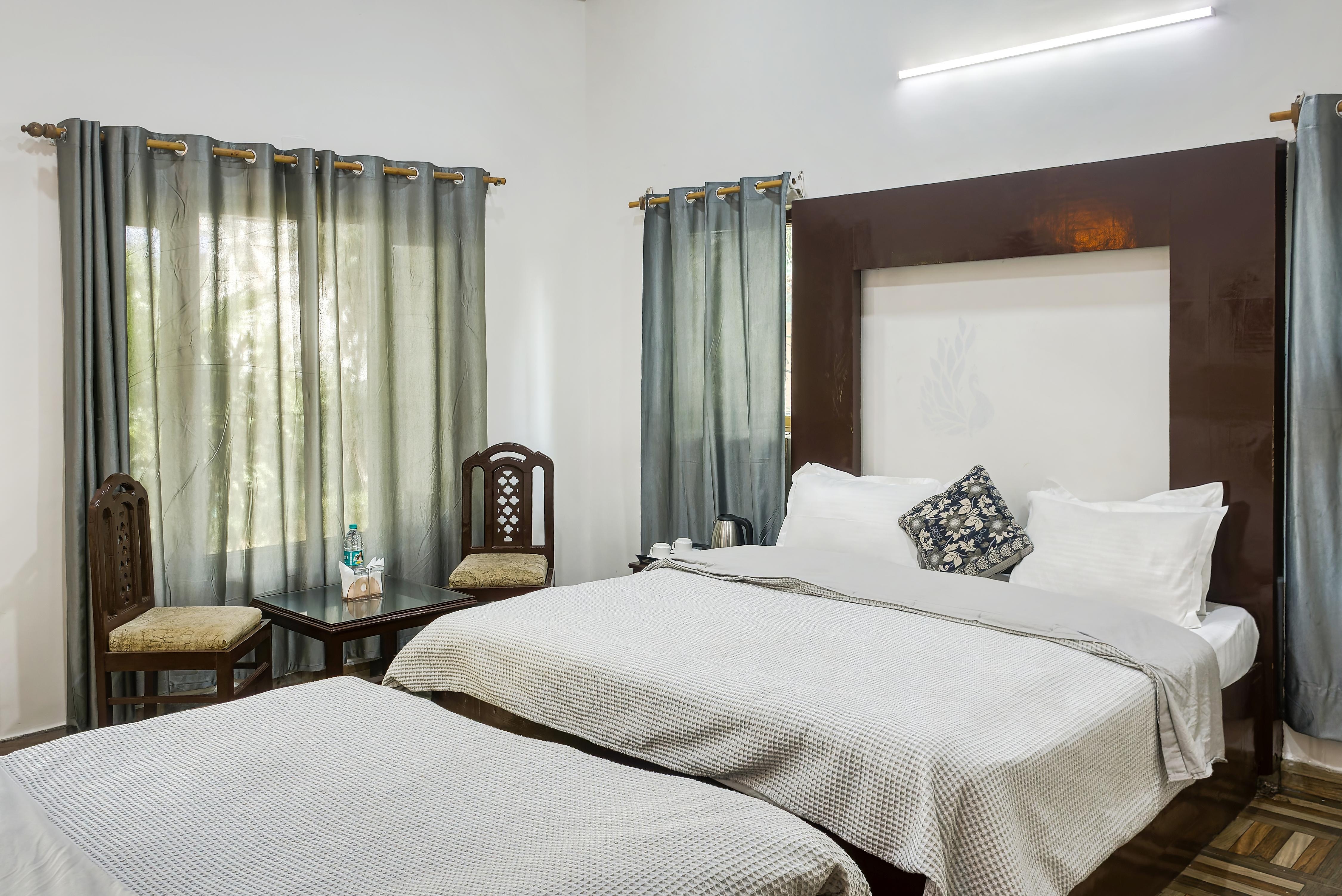 The Wild Orchid Resort Corbett - Tap to explore photos