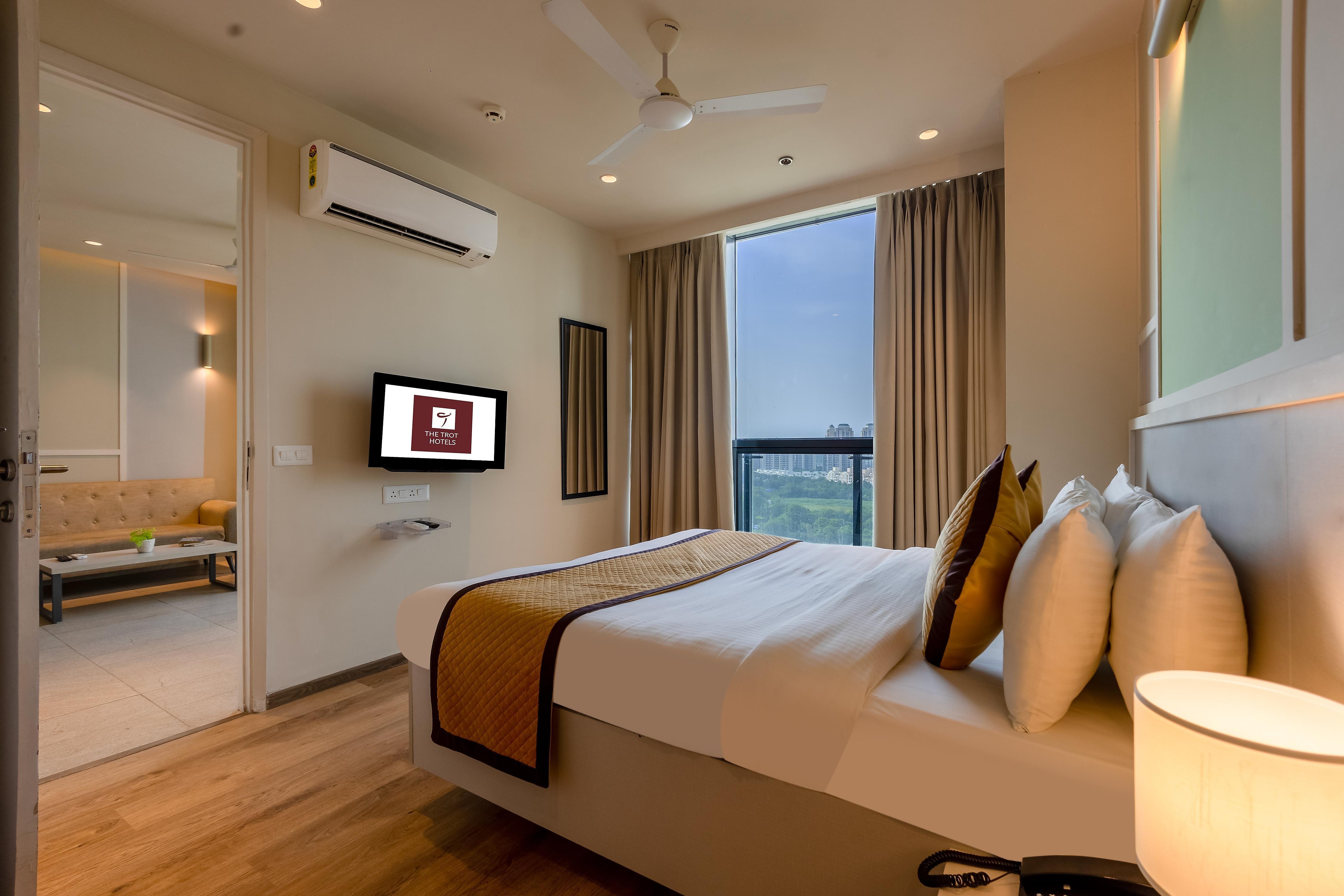 The Trot Hotel & Suites Near Yashobhoomi - Tap to explore photos