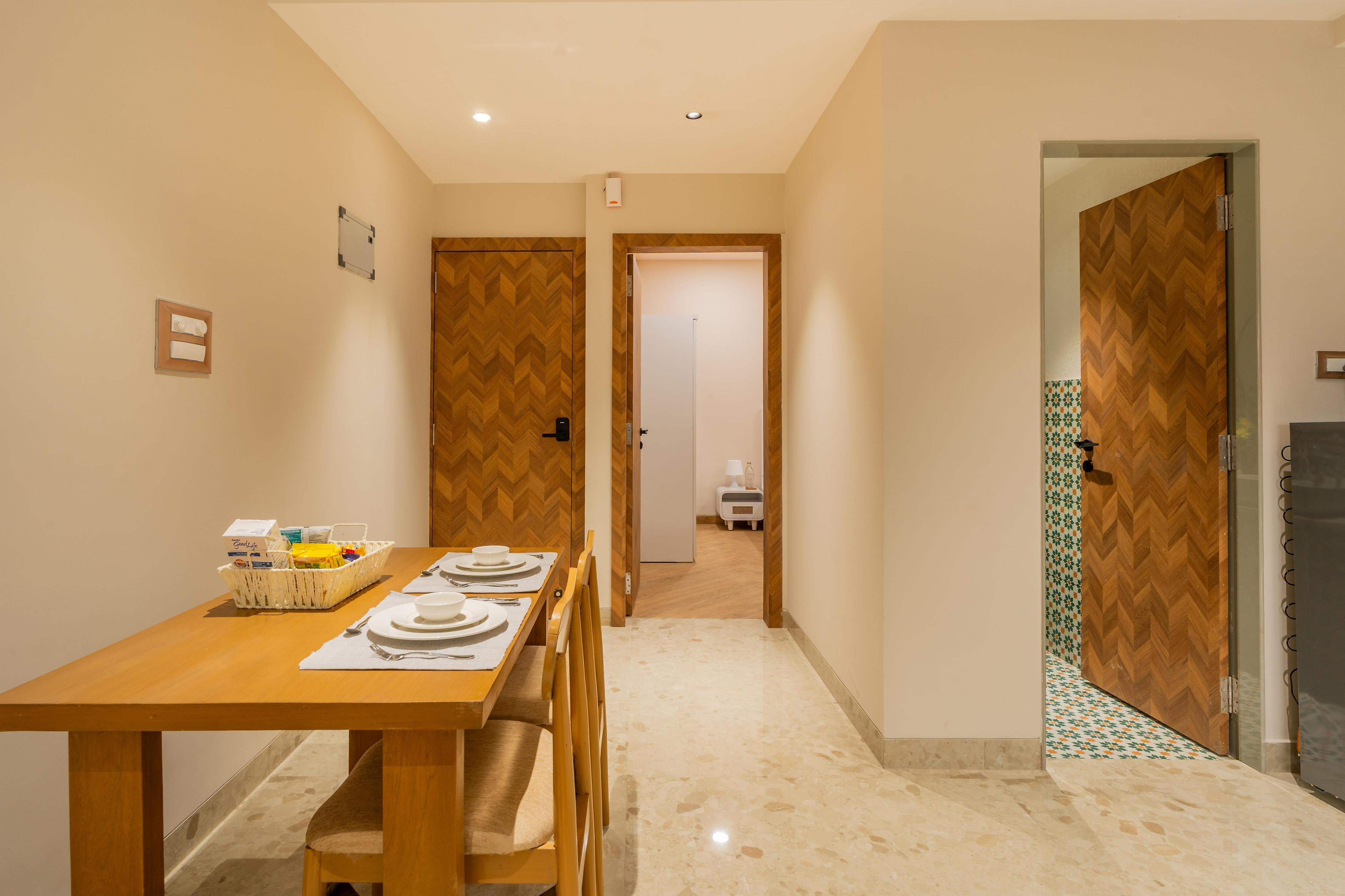 ELIVAAS Kamerios 1 BHK Apartments with shared Rooftop Pool - Tap to explore photos