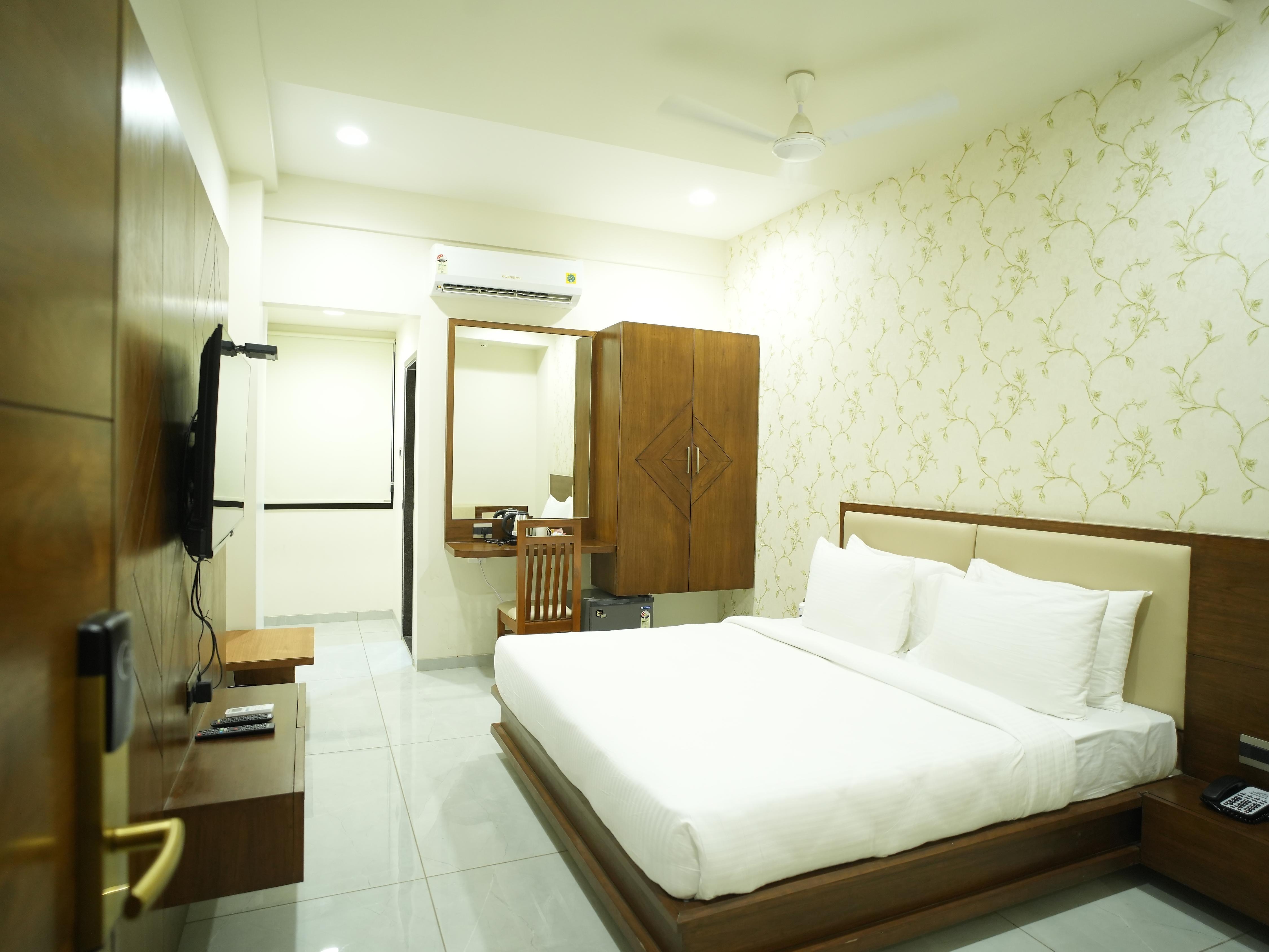 Pam Premium Hotel Vadodara - Tap to explore photos