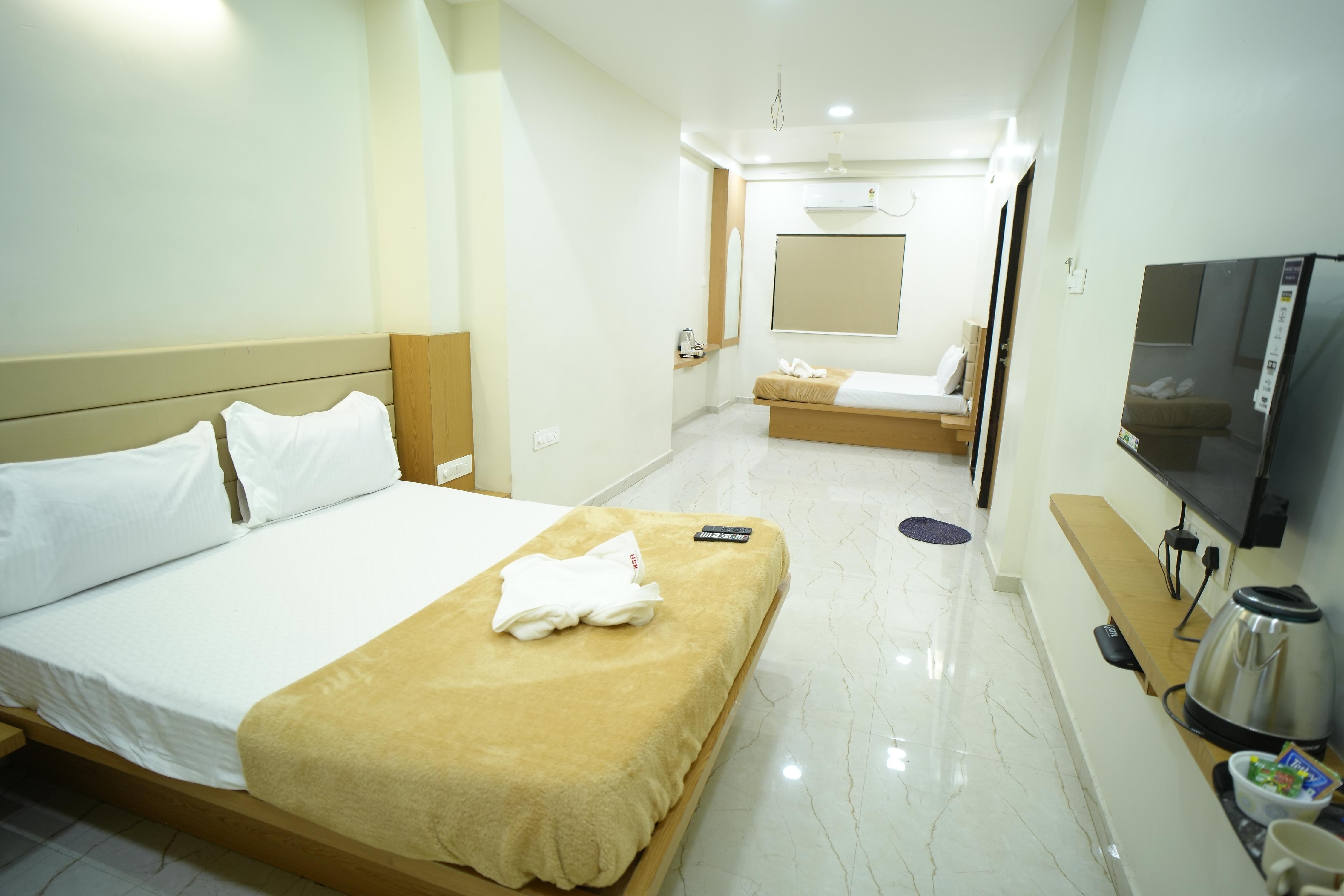 Hotel Sai Pratham - Tap to explore photos