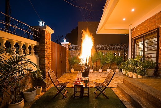 Classy 2 BHK Retreat With Picturesque Balcony & Outdoor Patio
