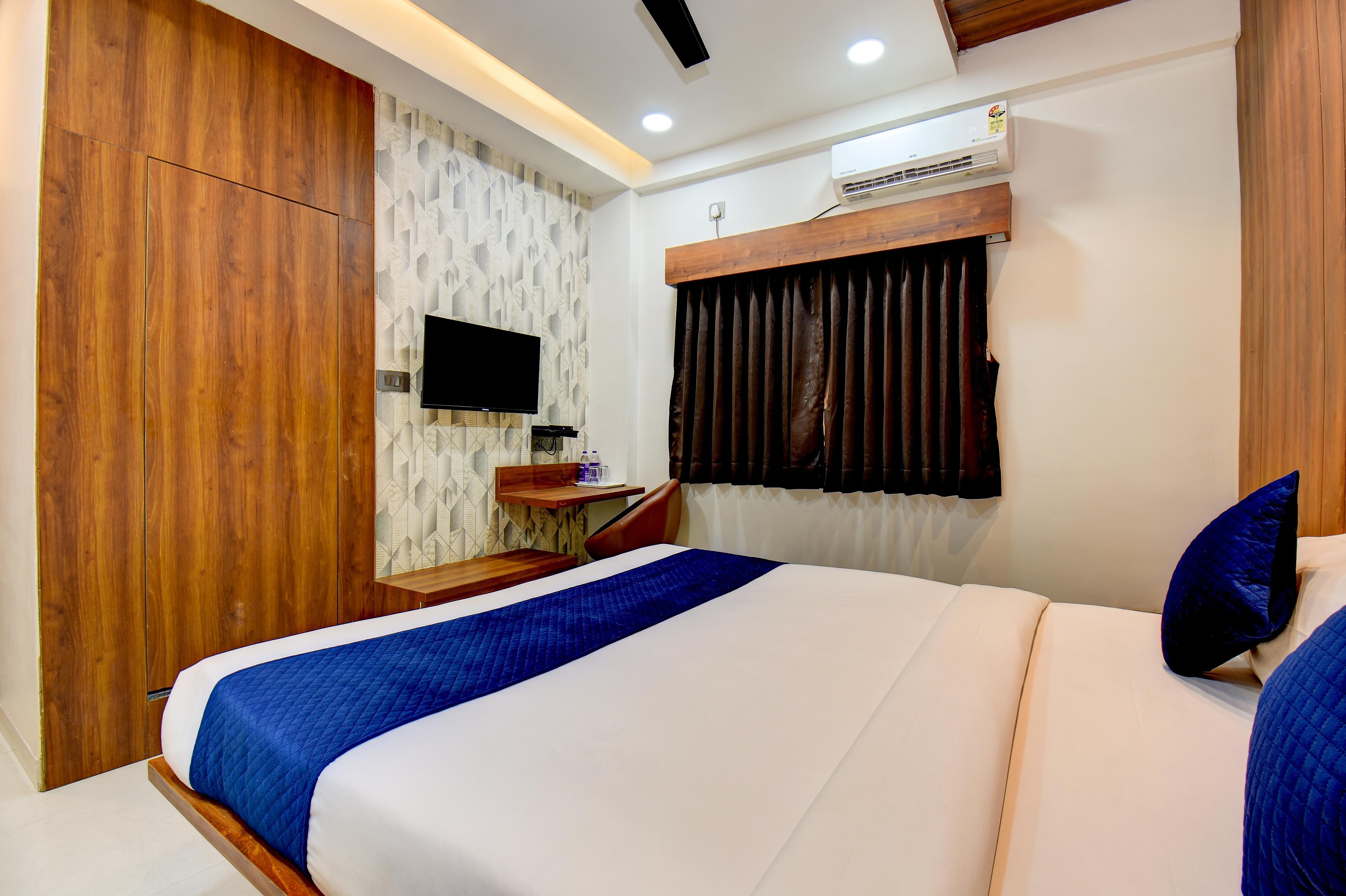 My Bizz Hotel Celebration Chakan - Tap to explore photos