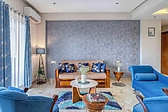 tisyastays | Aqua 2BHK Apartment with Pool & Gym , Close to beach, Goa