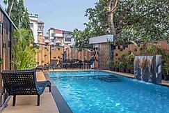 tisyastays | Aqua 2BHK Apartment with Pool & Gym , Close to beach, Goa