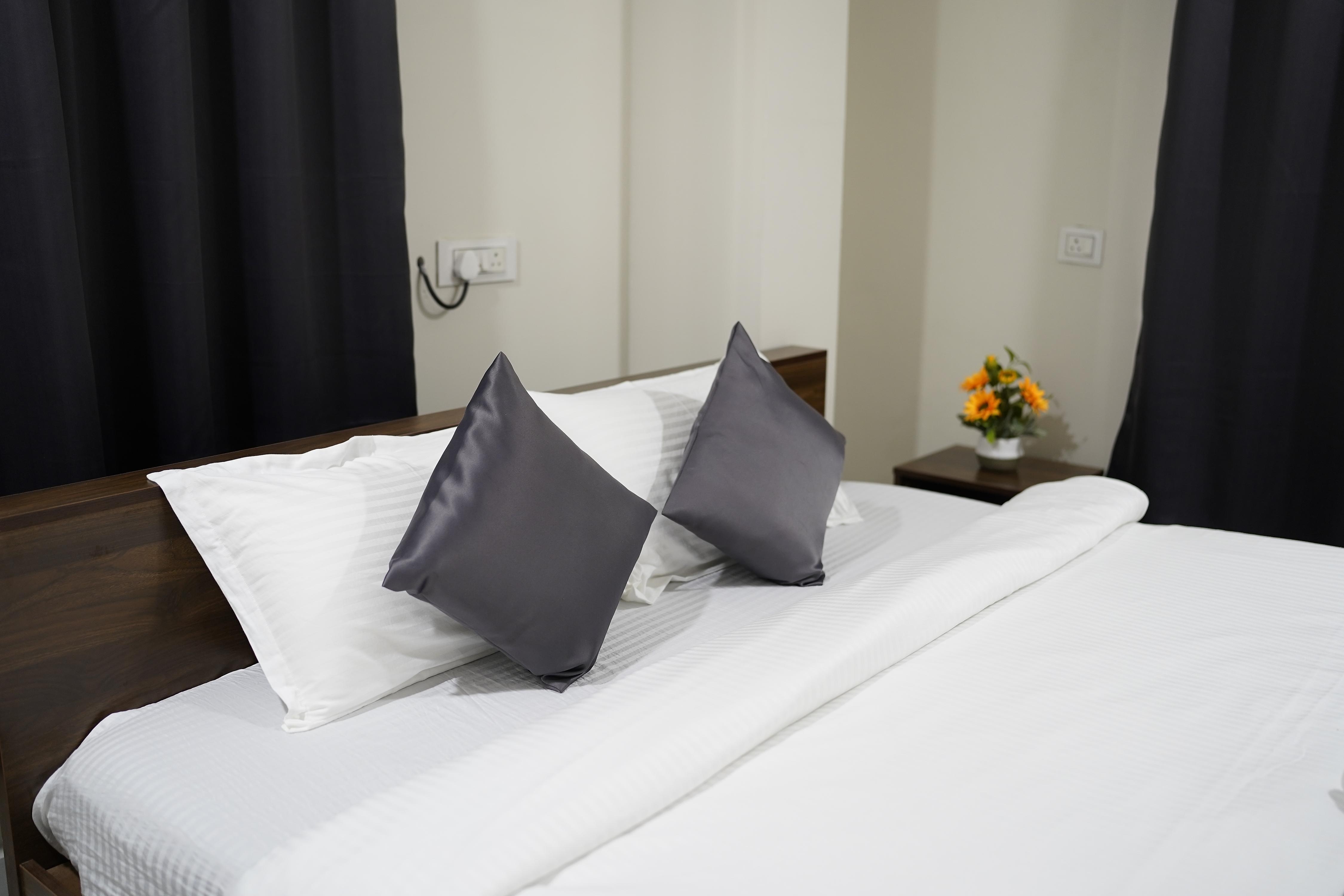 Dwaraka Heaven Luxury rooms - Tap to explore photos