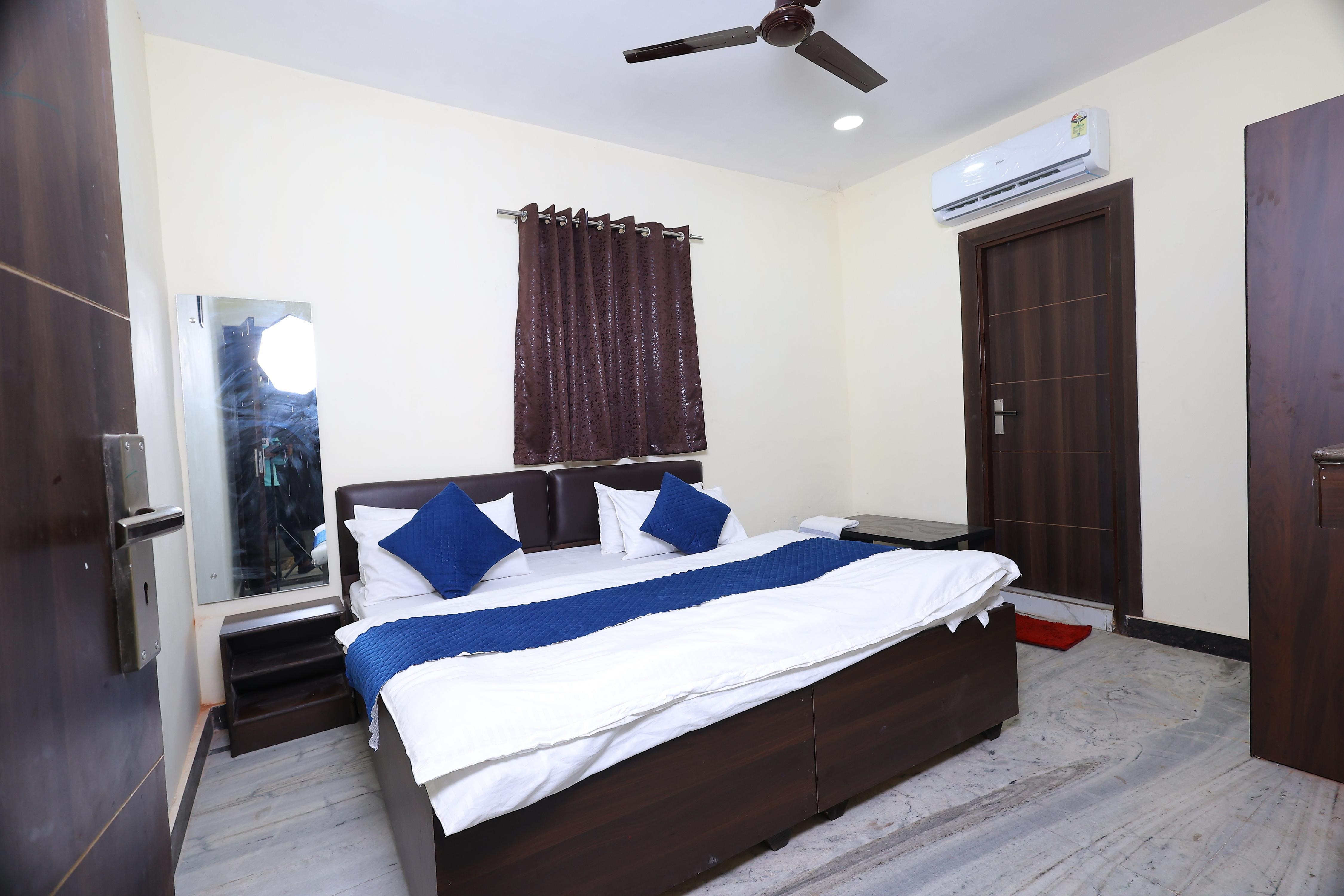 Hotel Tridev - Tap to explore photos