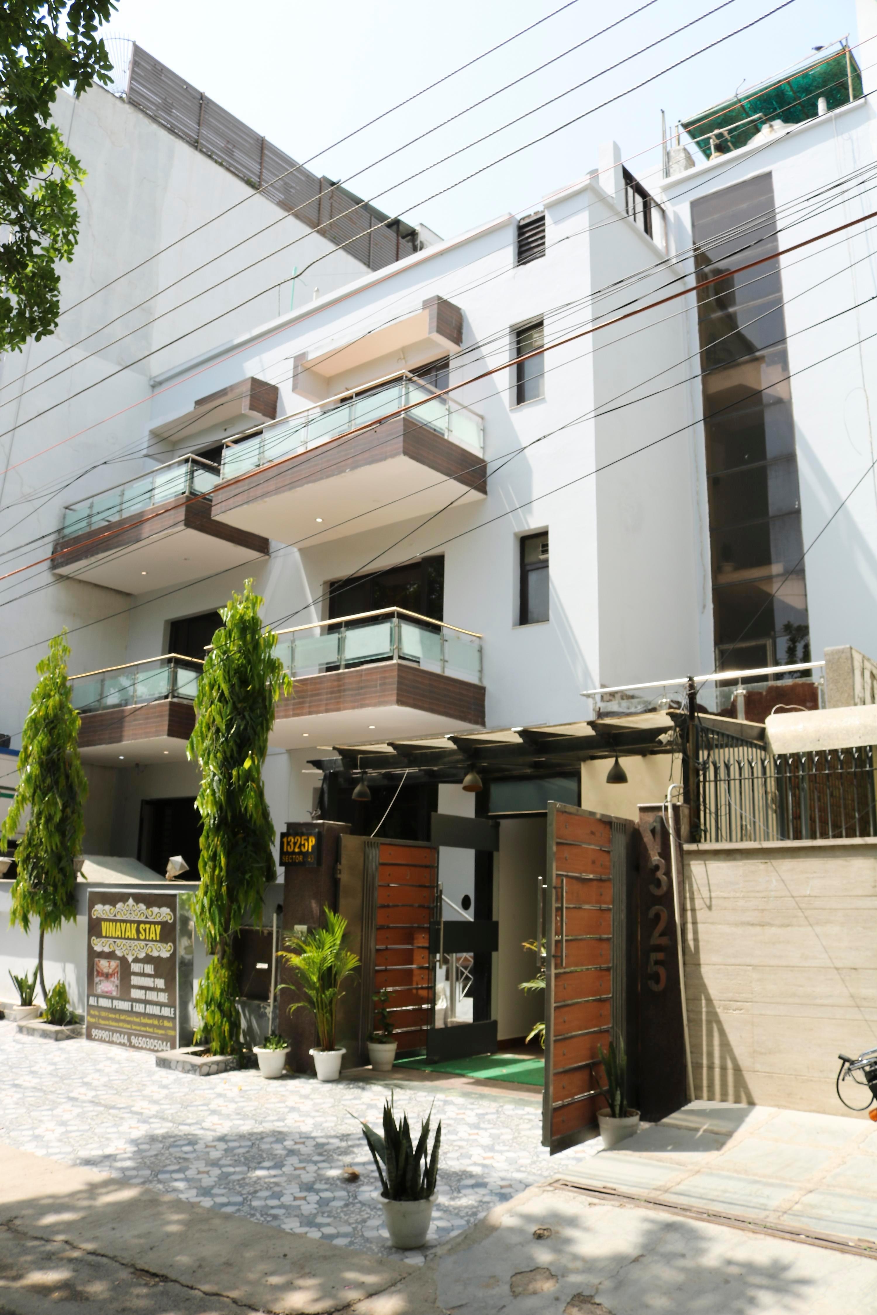 Vinayak Stay Sector 43 - Tap to explore photos