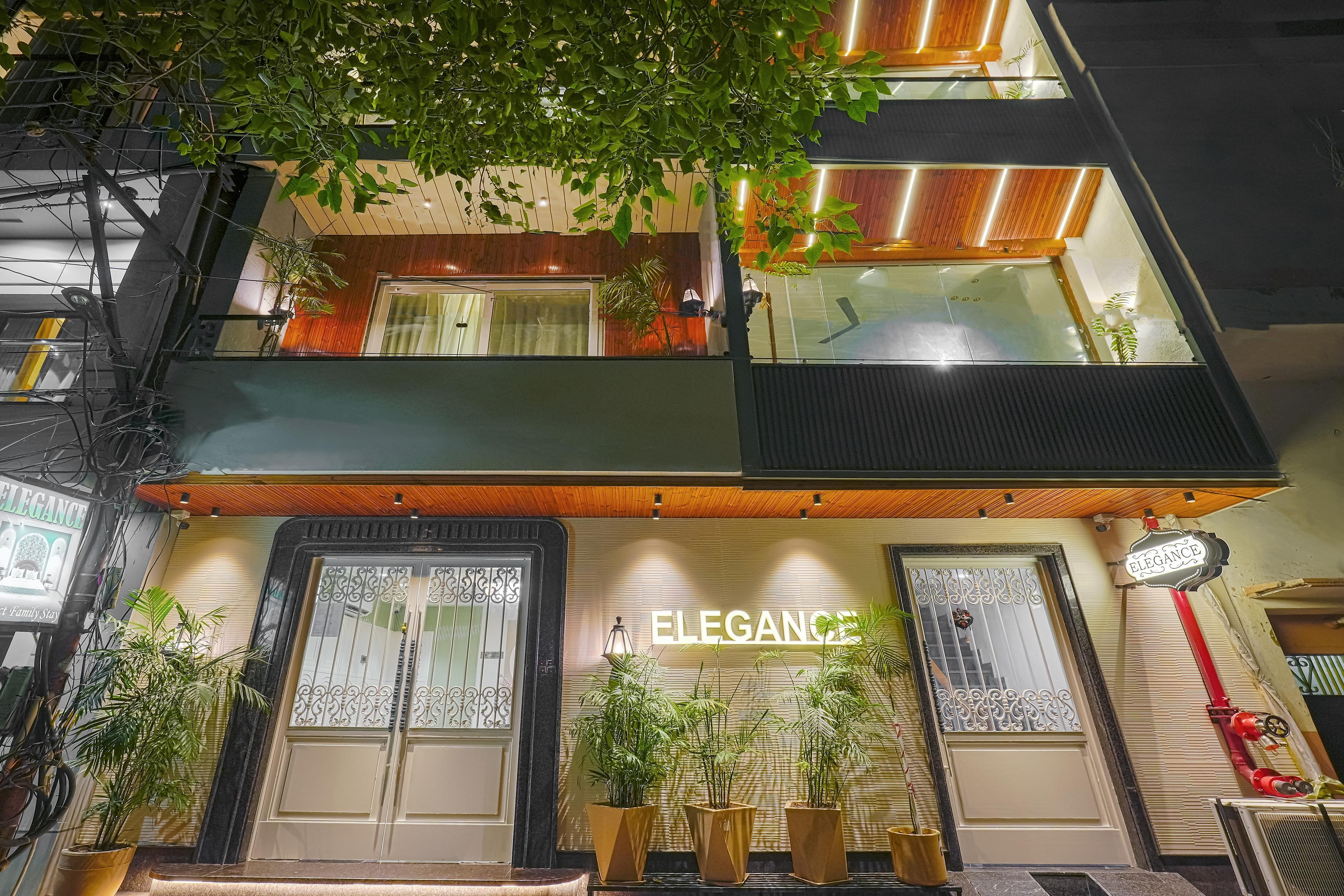 Elegance A Boutique Stay - Tap to explore photos