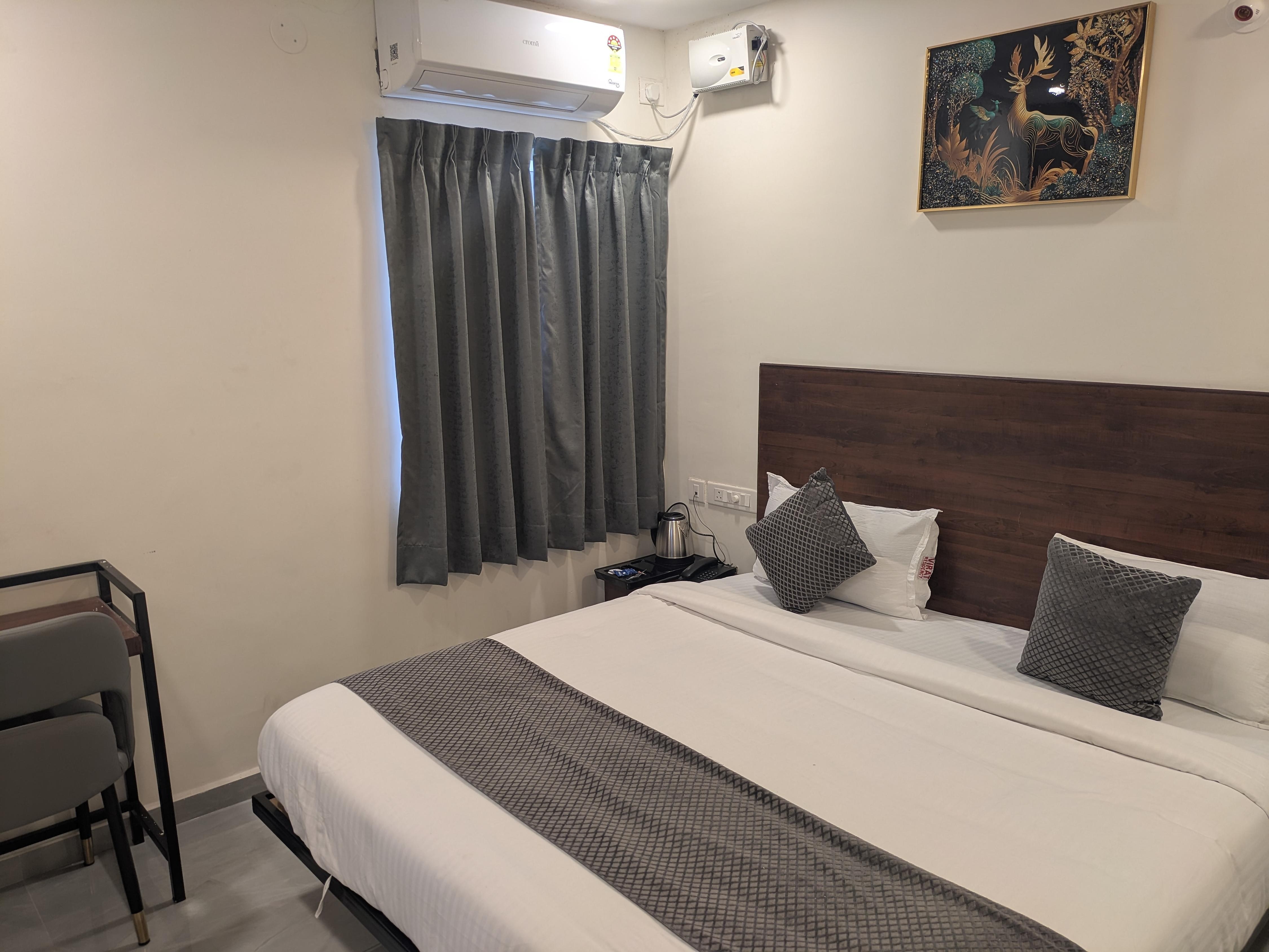 Hotel Virat Elite - Tap to explore photos