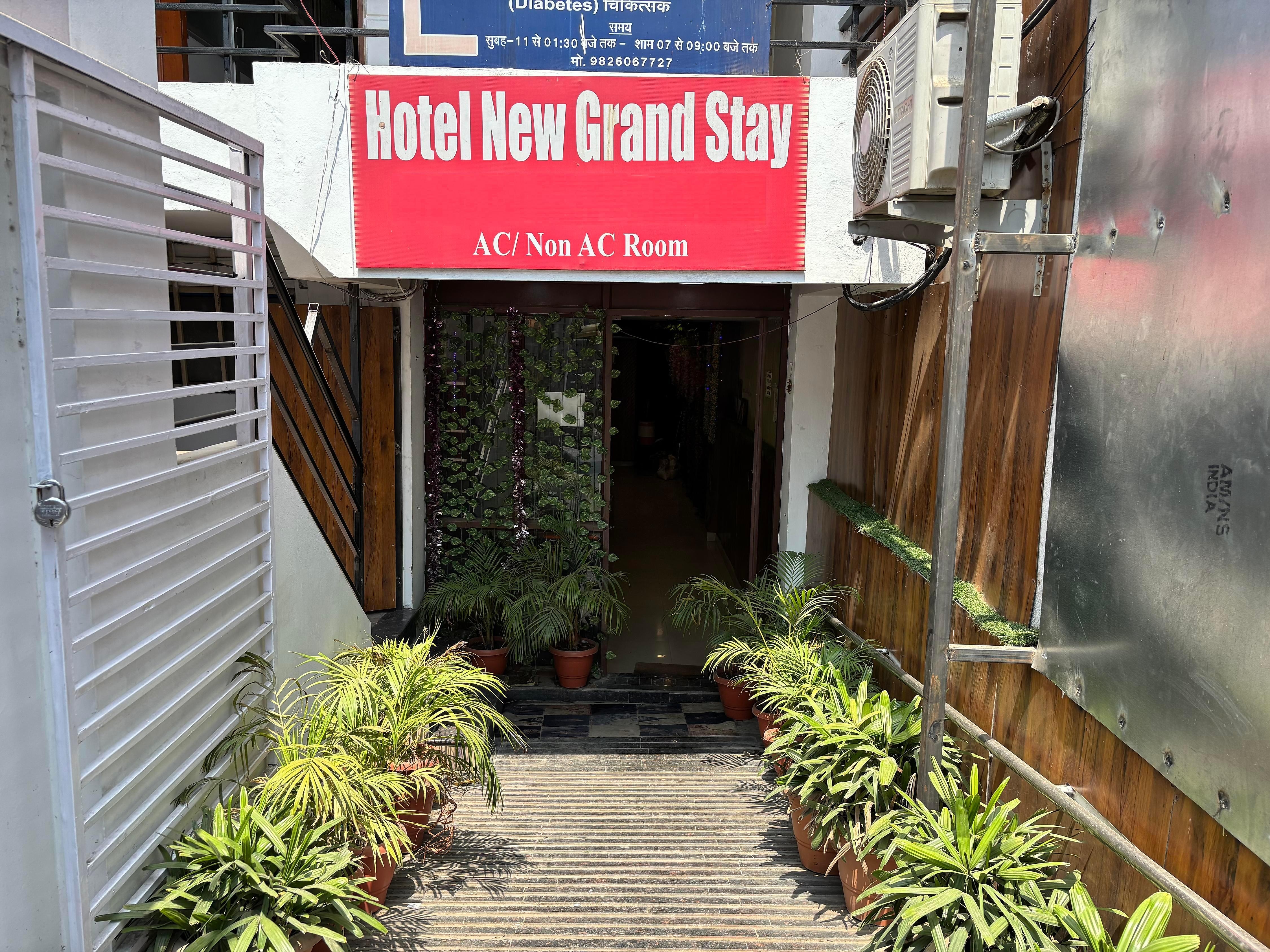 Hotel The New Grand Stay - Tap to explore photos