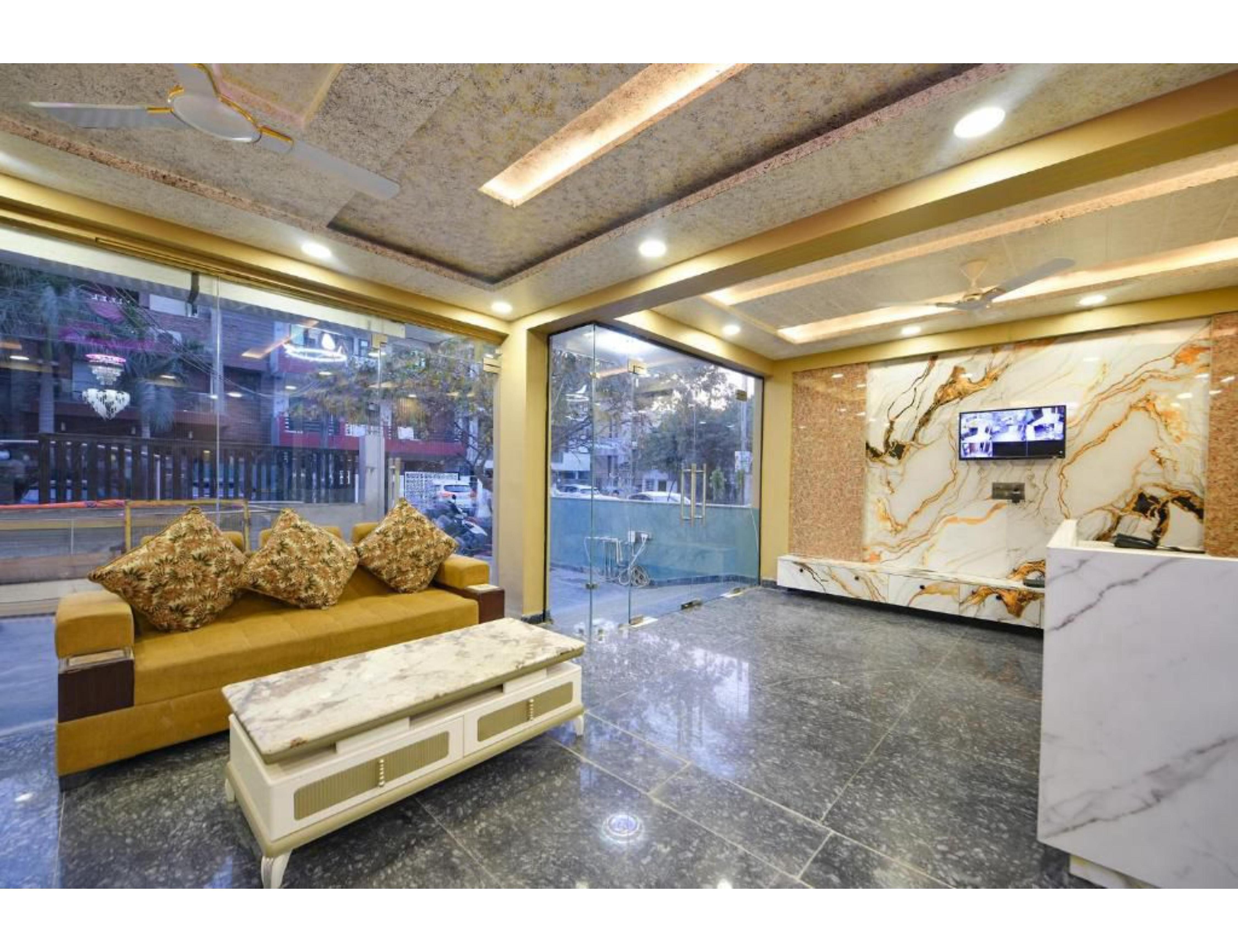 DM 1664 Premium Stay near Unitech Cyber Park & HUDA Metro | Includes Breakfast - Tap to explore photos