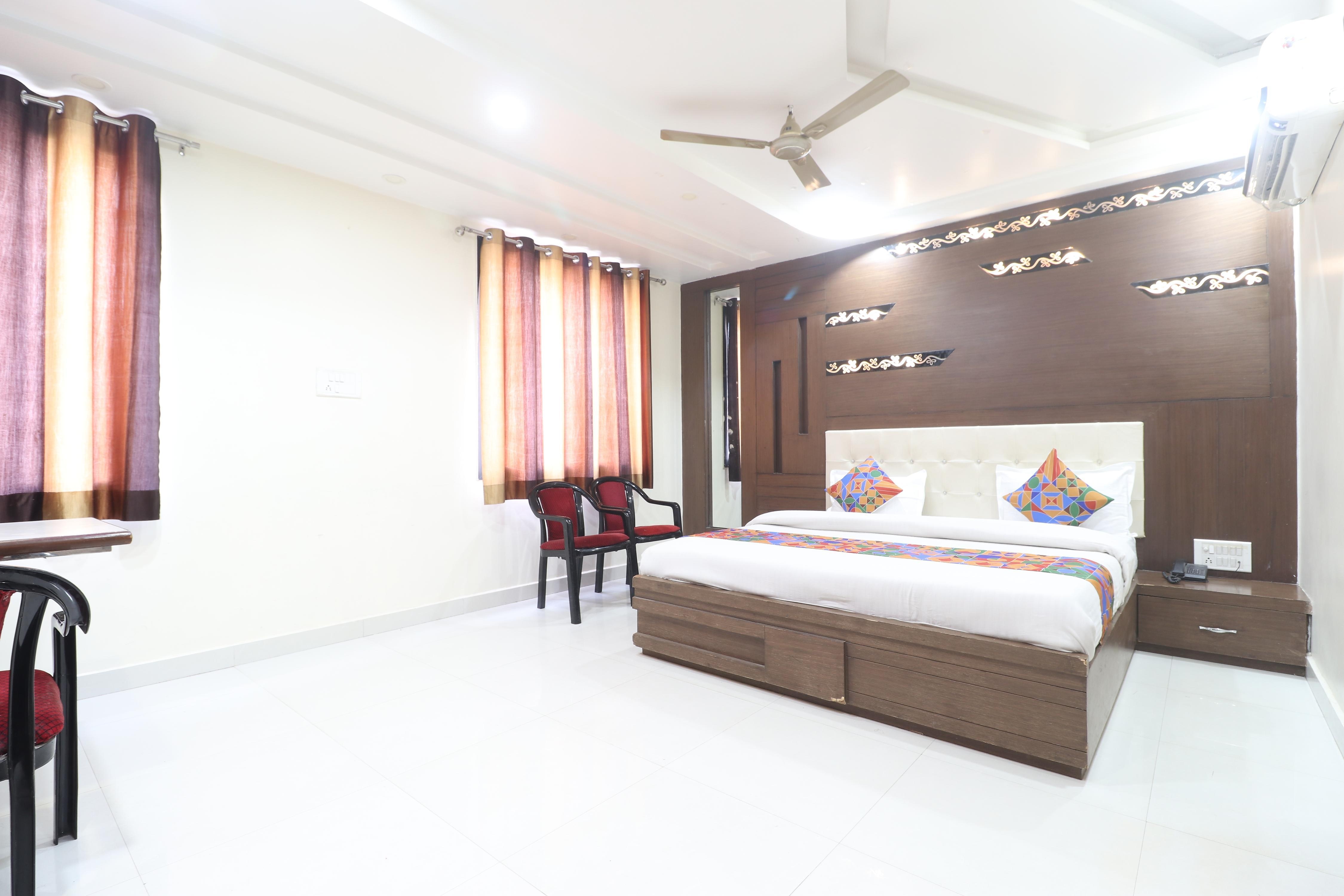 TRPOTELS Geeta Colony - Tap to explore photos