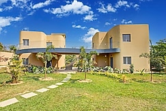 ELIVAAS Urvi Resort | Eco-Luxury Getaway with Pool, Garden & Game Zone, Bangalore