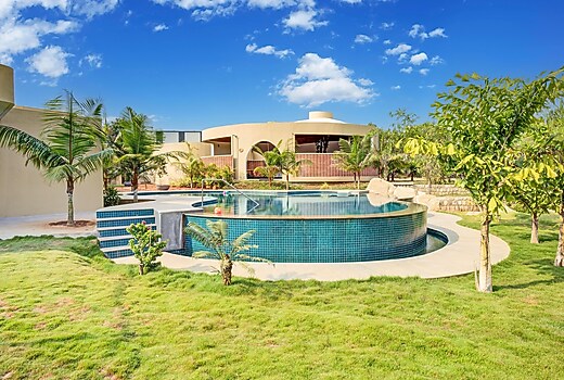 ELIVAAS Urvi Resort | Eco-Luxury Getaway with Pool, Garden & Game Zone
