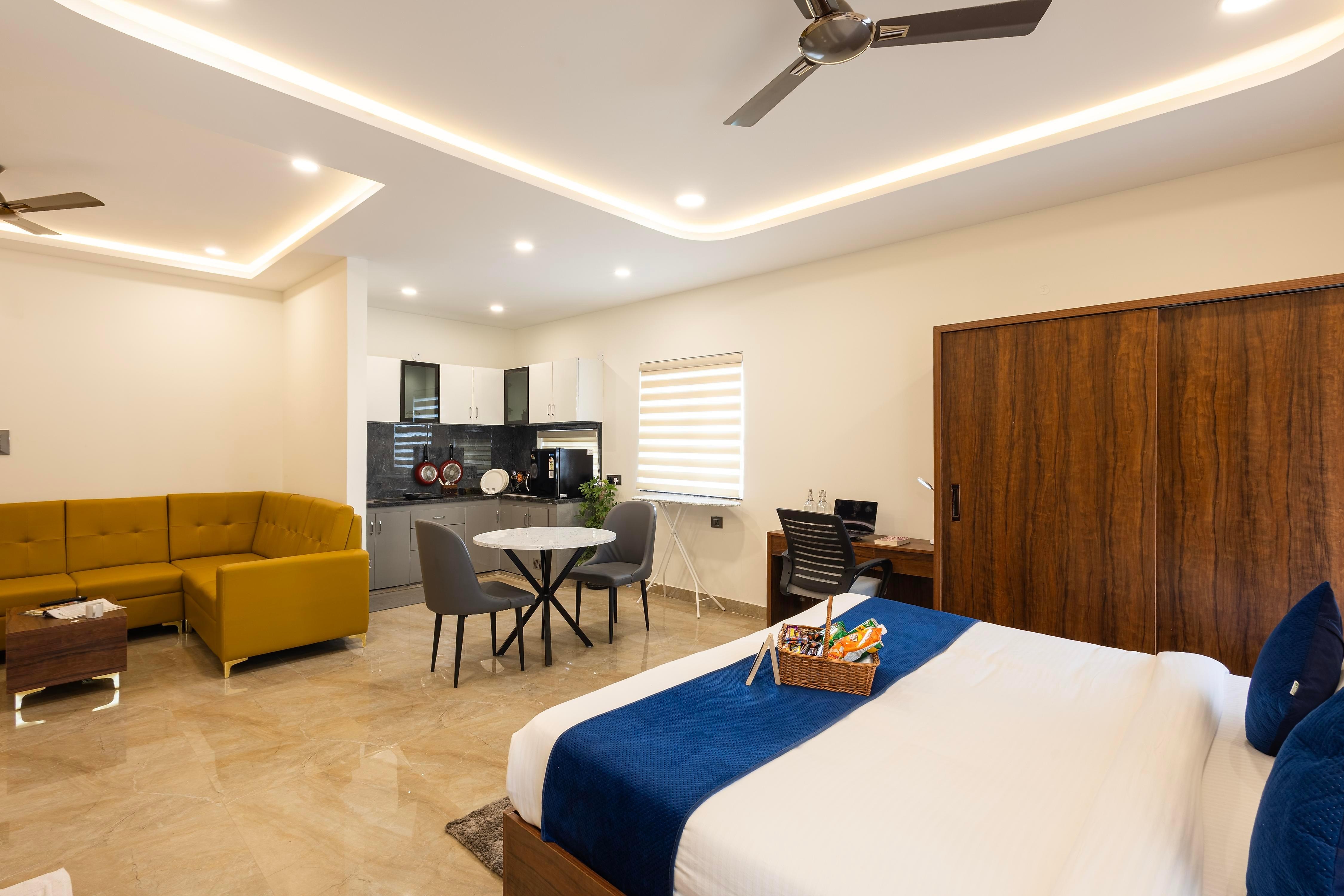 Elysium Studio Suites - Tap to explore photos