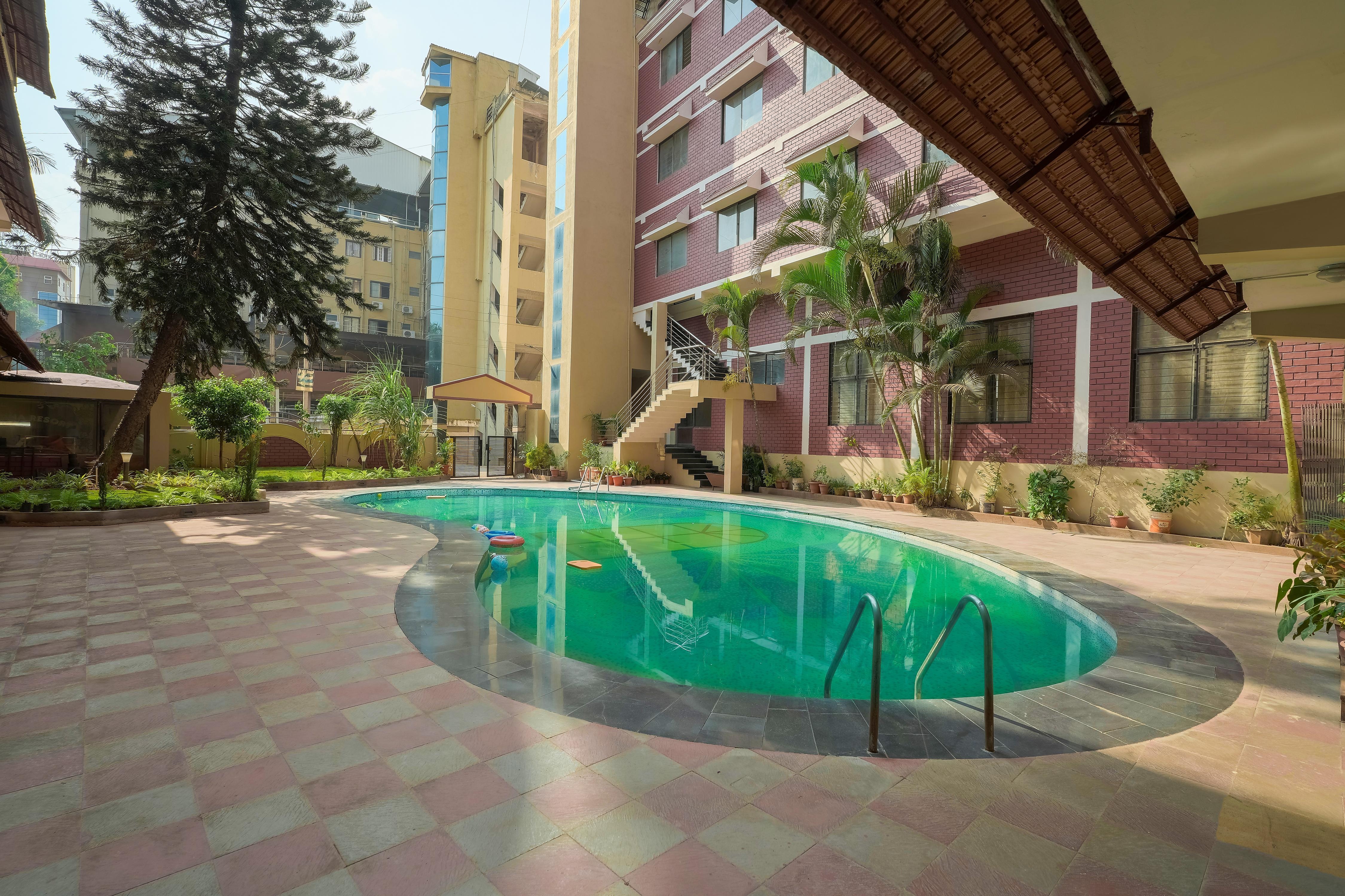 New Suvarna Resort - Tap to explore photos