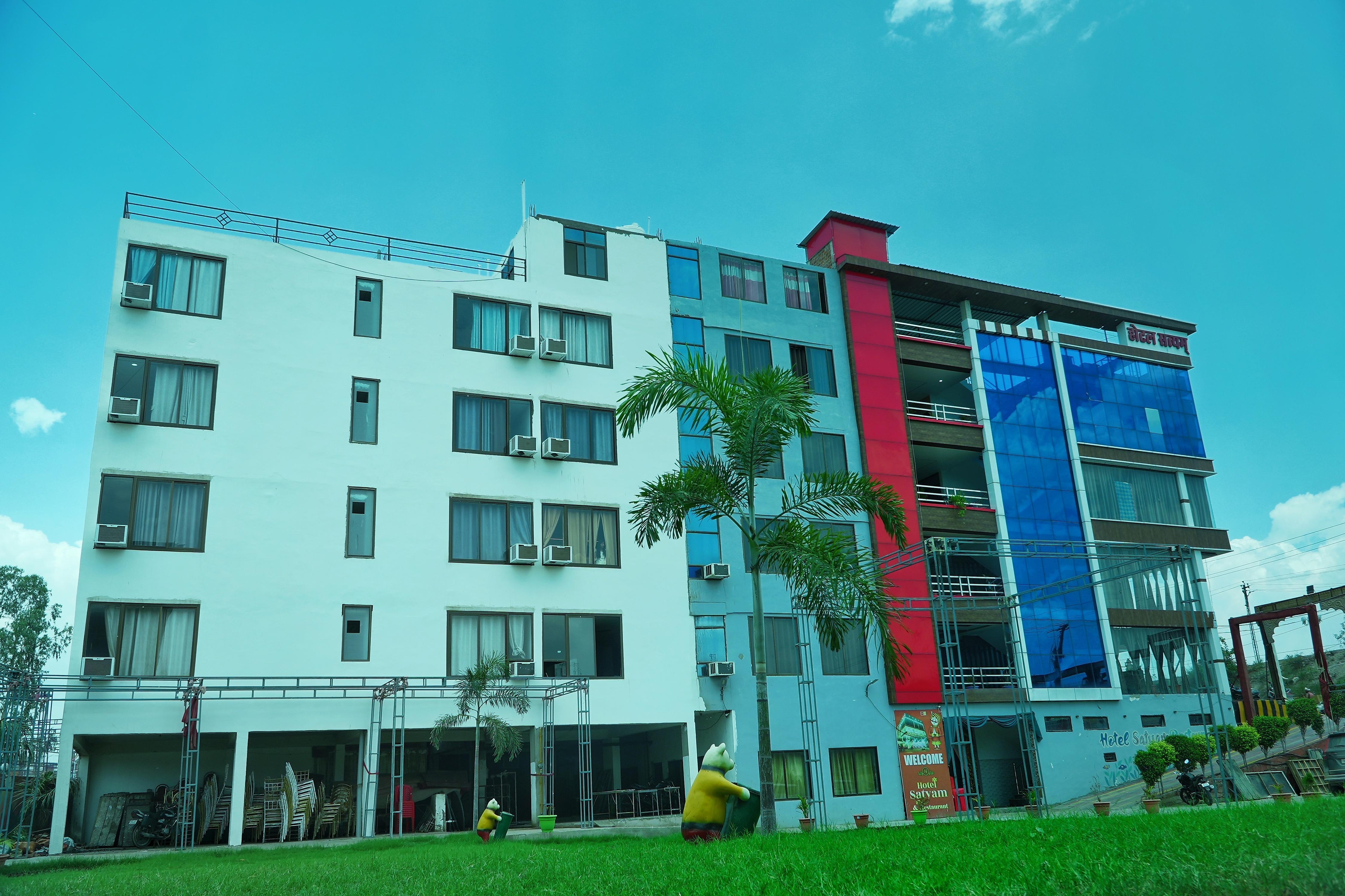 Hotel Satyam - Tap to explore photos