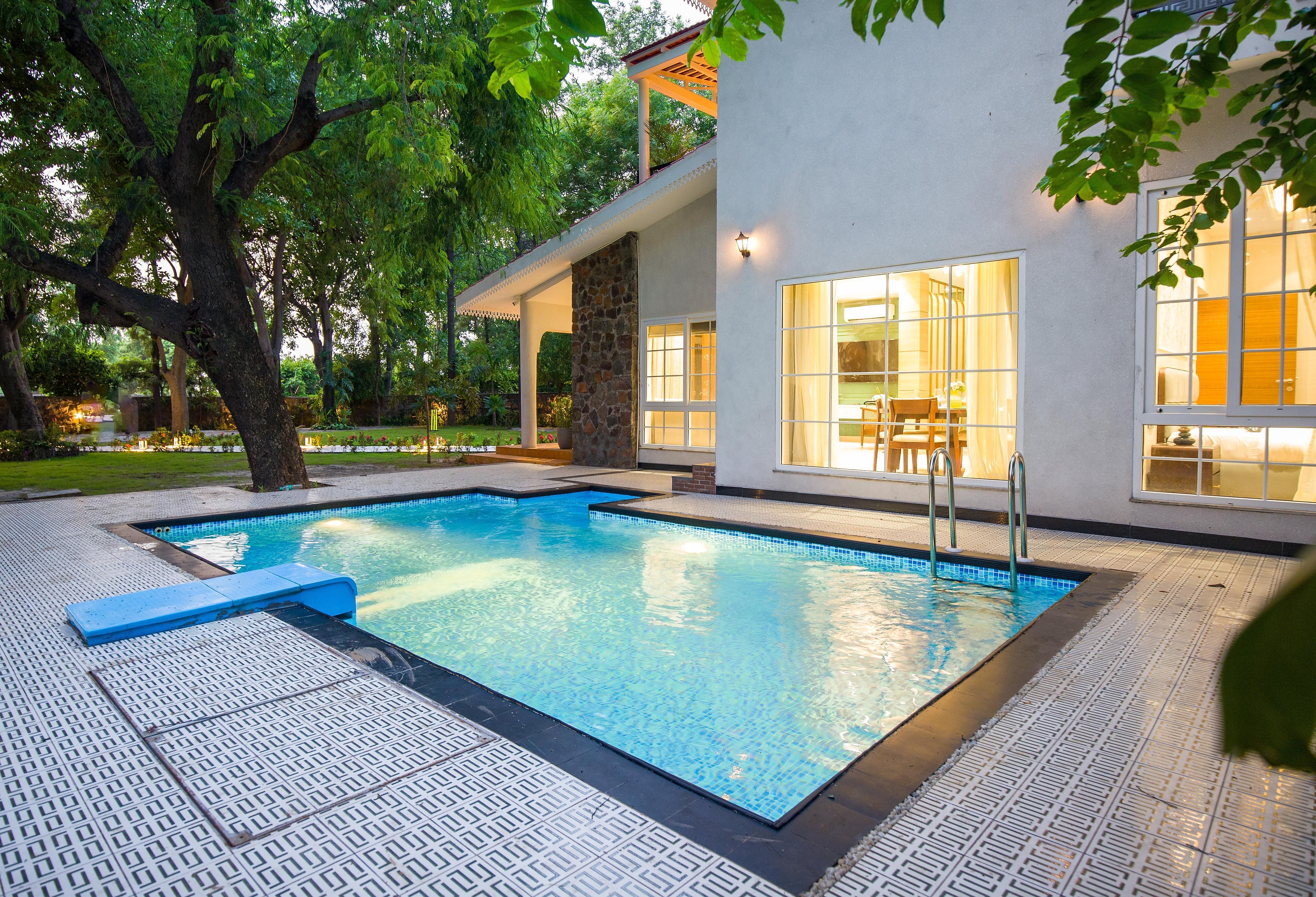 ELIVAAS Varsha Greens | A 4-BHK Retreat with Private Pool & Outdoor Patios - Tap to explore photos