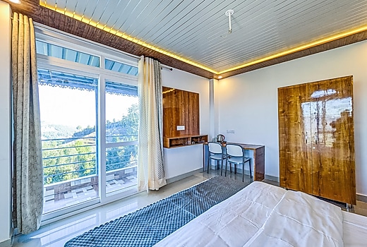 Petal Peak Retreat 2BR-FF Homestay by Homeyhuts