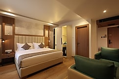 Grand Plaza Inn by RAK Rooms, Kannur, Kannur