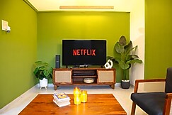 Cozy Designer 1BHK w/ Balcony & Park View, Satara