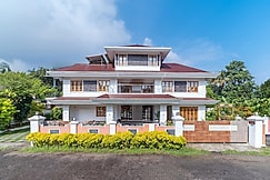 ELIVAAS Signature Heaven View | Teak Atrium 6 BHK Family Home, Cochin