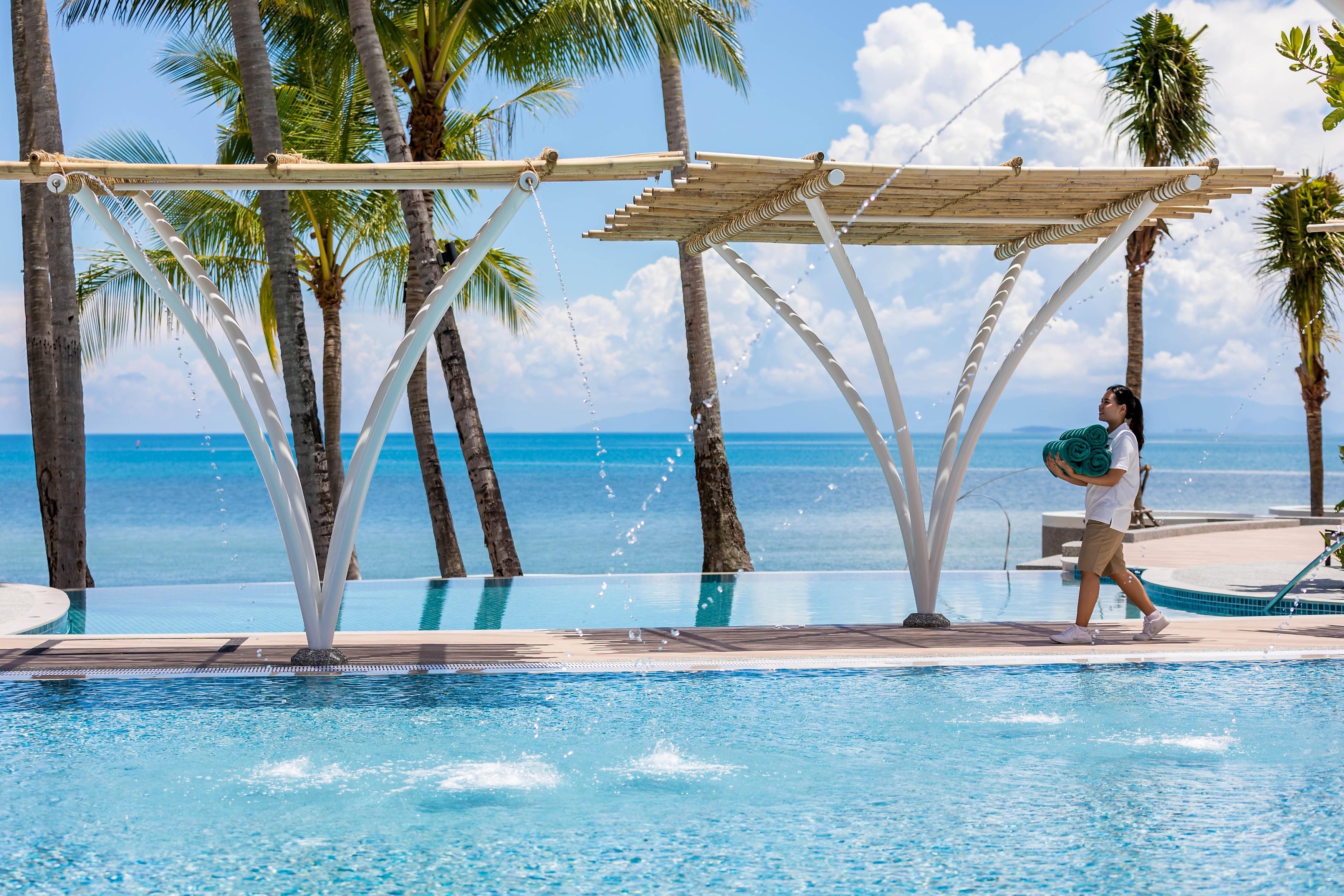 Outrigger Koh Samui Beach Resort - Tap to explore photos