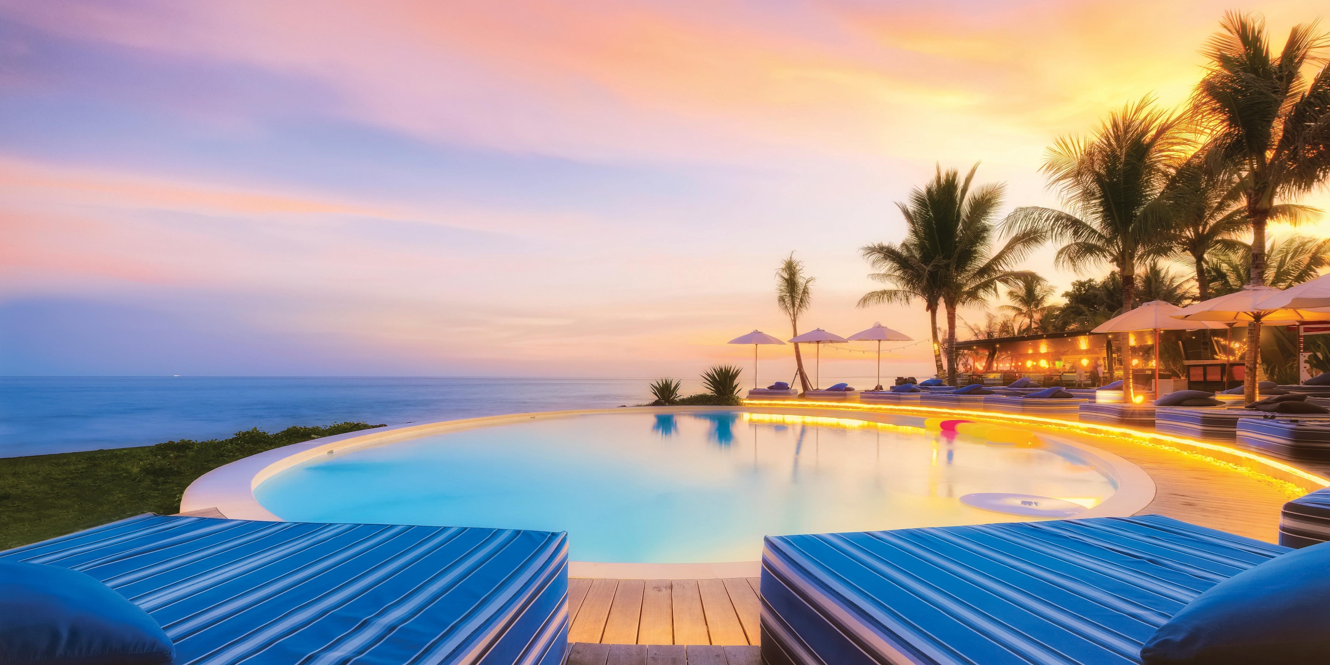 Komune Resort & Beach Club - Tap to explore photos