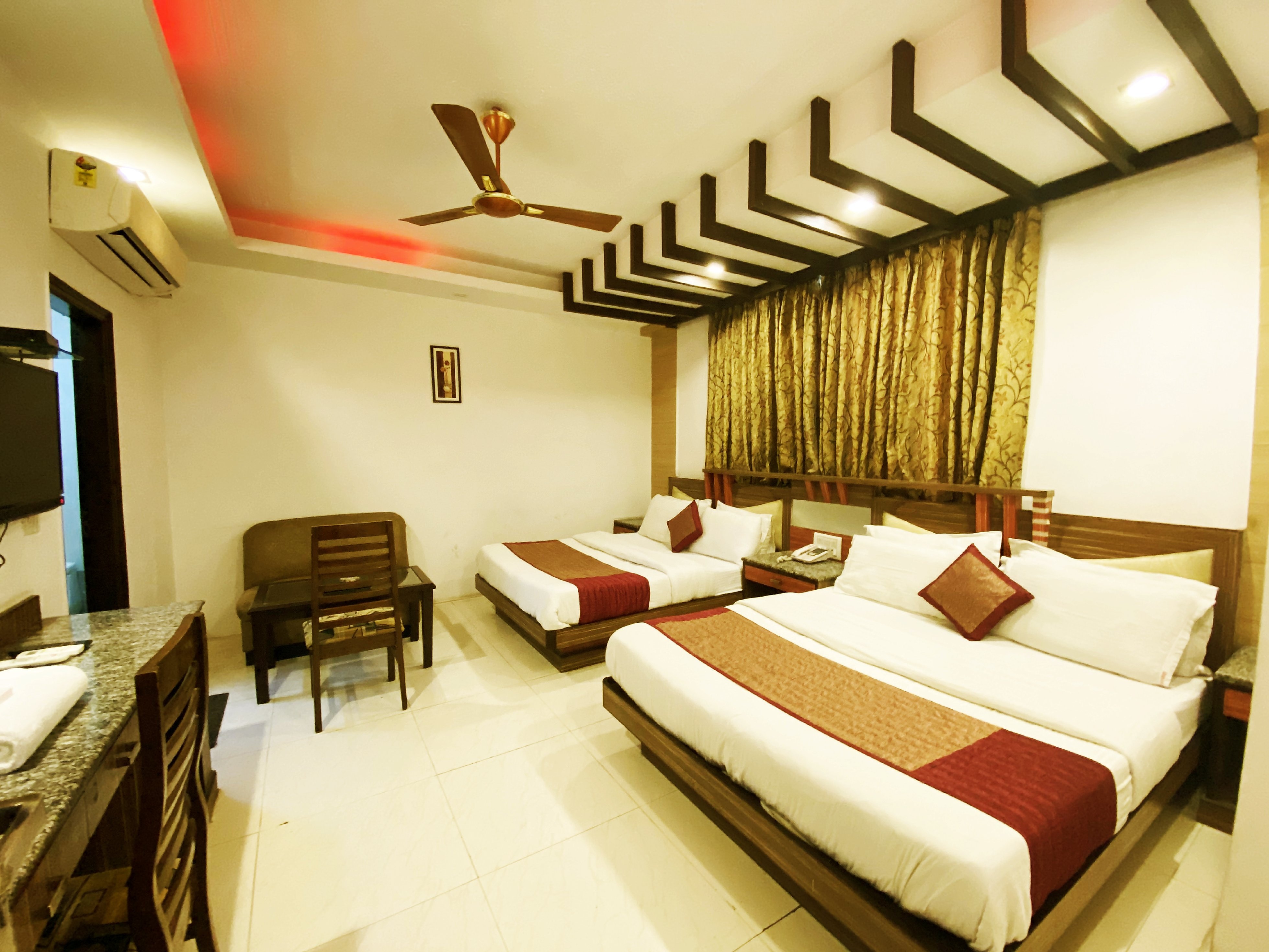 Hotel Baba Deluxe - By RCG Hotels - Tap to explore photos