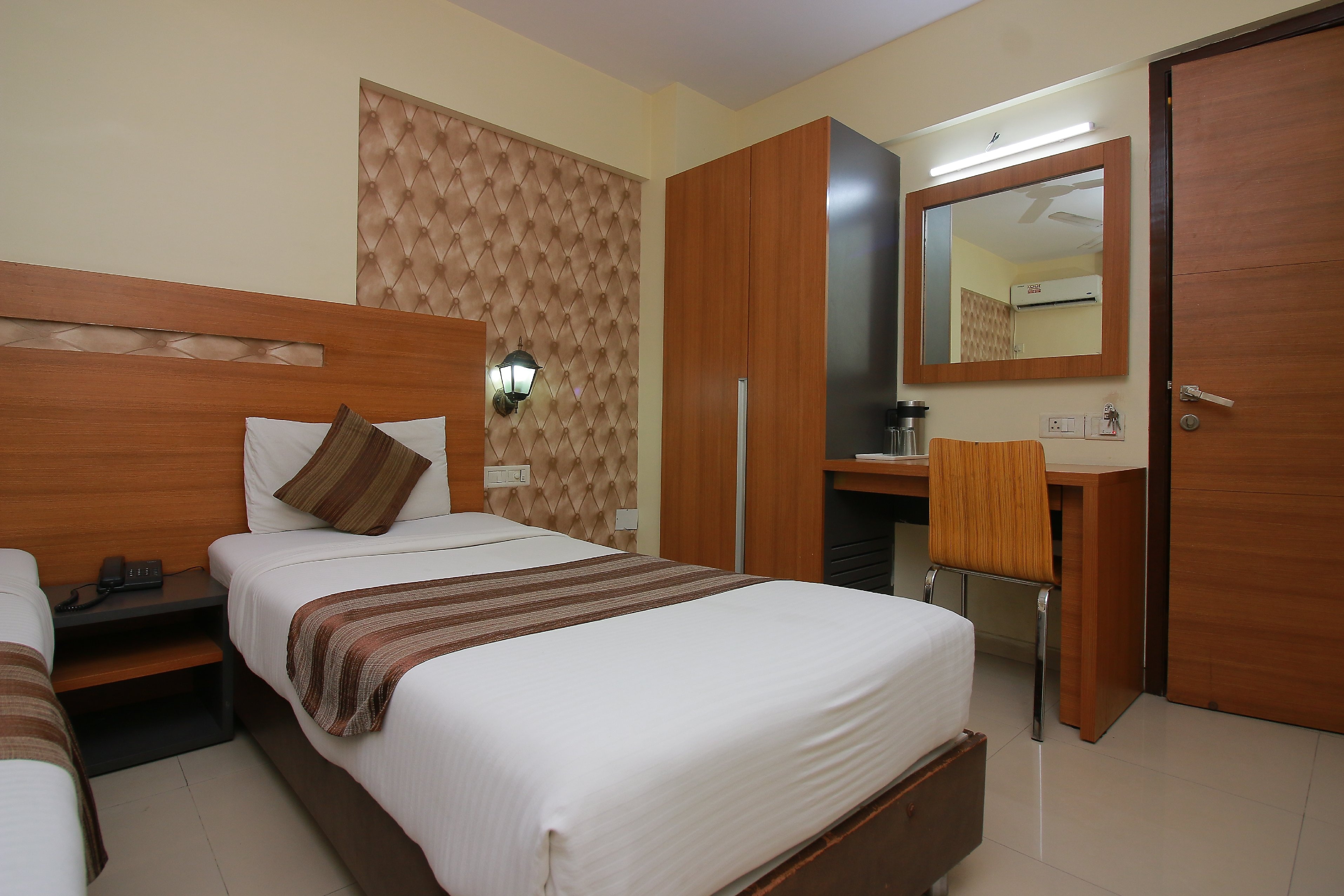 Hotel Tanish Residency  - Tap to explore photos