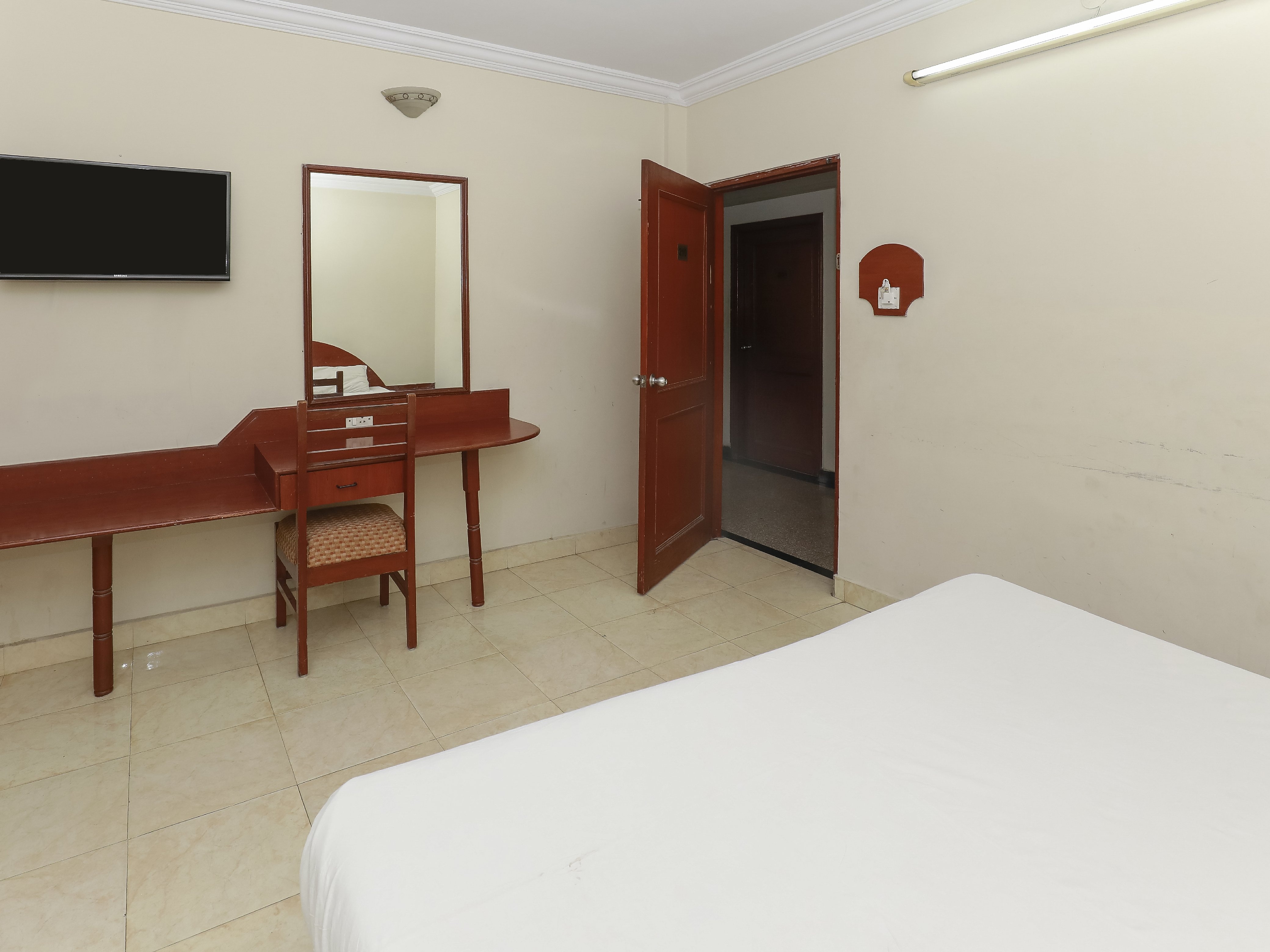 Hotel Urvasi Residency - Tap to explore photos