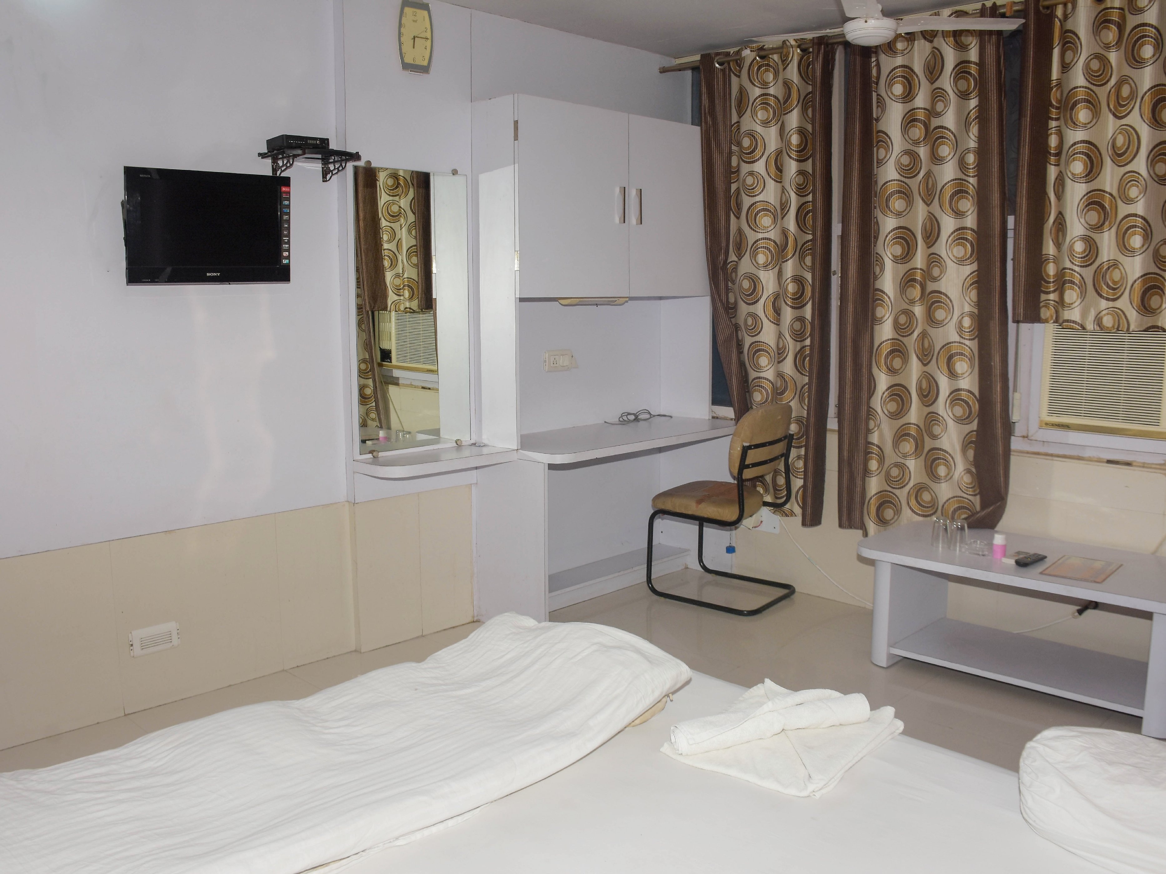 Hotel Krishna White House International - Tap to explore photos